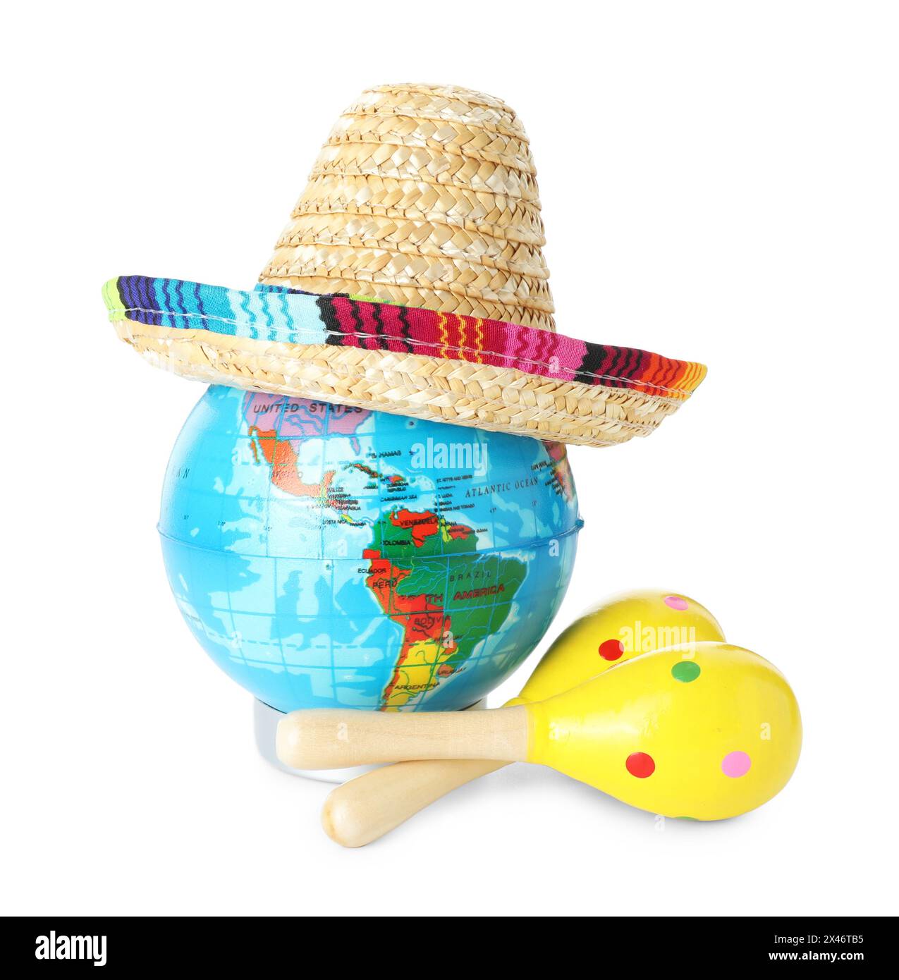 Globus mit mexikanischem Sombrero-Hut und Maracas isoliert auf weiß Stockfoto