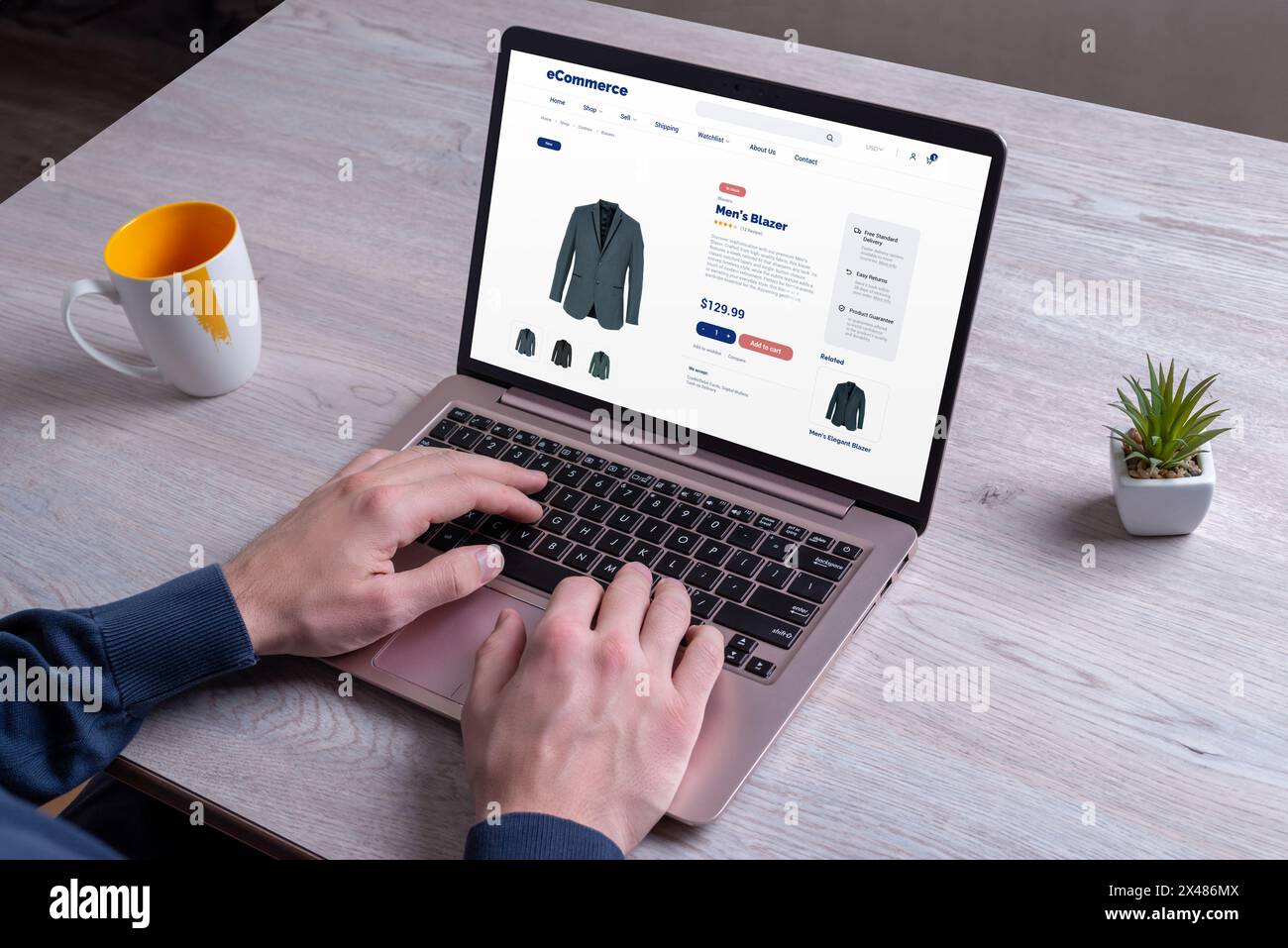 Kaufen Sie online Blazer für Herren, entdecken Sie verschiedene Farben und nutzen Sie ein Notebook auf einer E-Commerce-Plattform für ein nahtloses Erlebnis Stockfoto