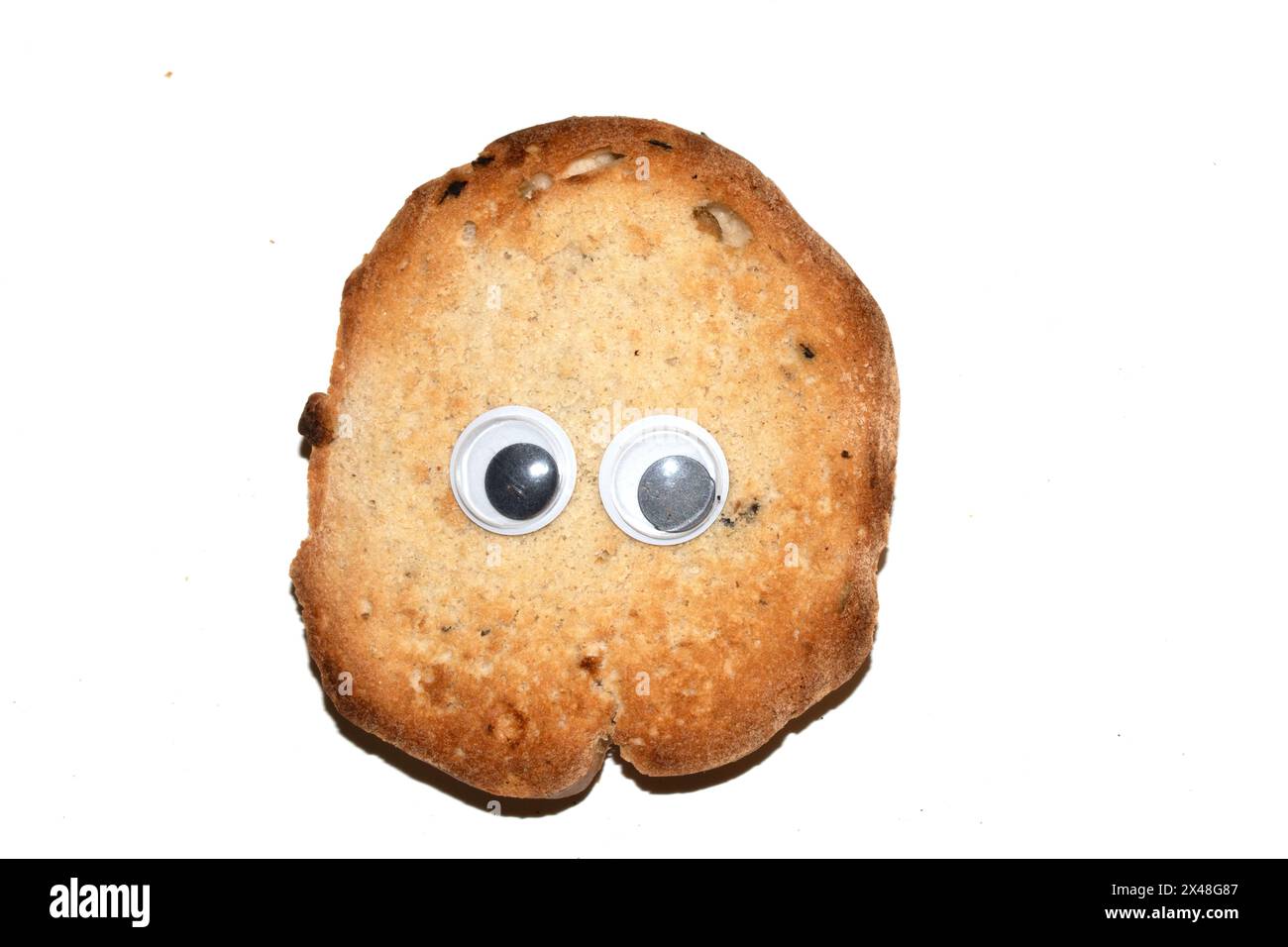 Ein lustiges Toast Brotbrötchen mit wackeligen Augen Stockfoto