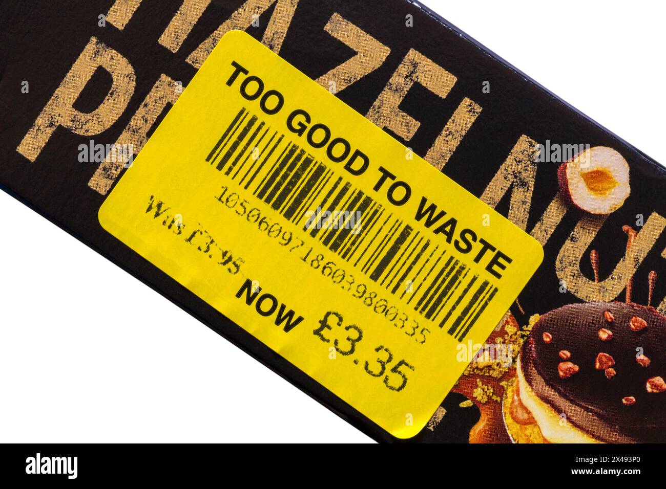 Gelber Aufkleber auf der Schachtel mit Gü Hazelnut Praline Zillionaire Limited Edition Käsekuchen Stockfoto