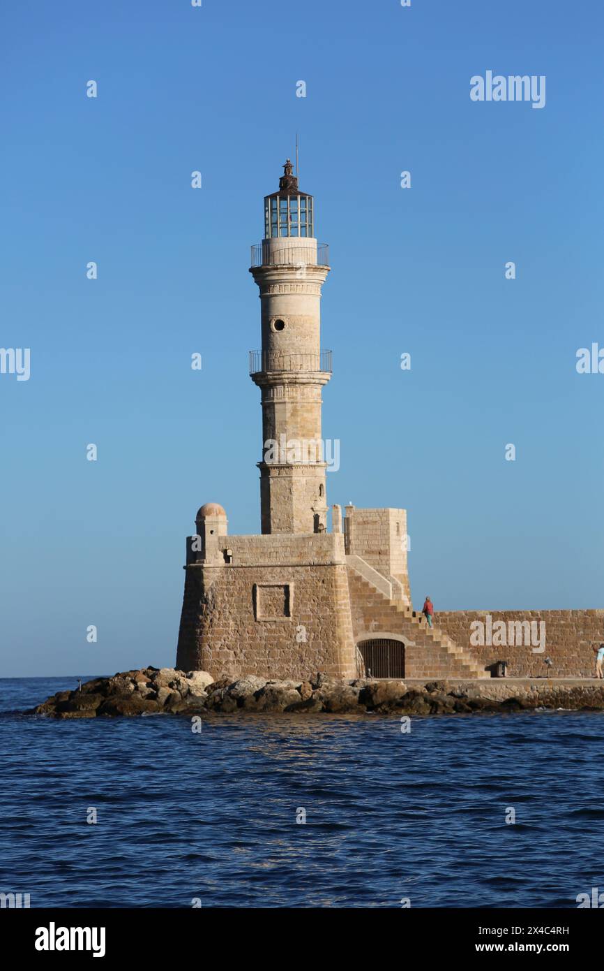 Chania, Kreta, Griechenland. Chania Lighthouse und Touristen Stockfoto