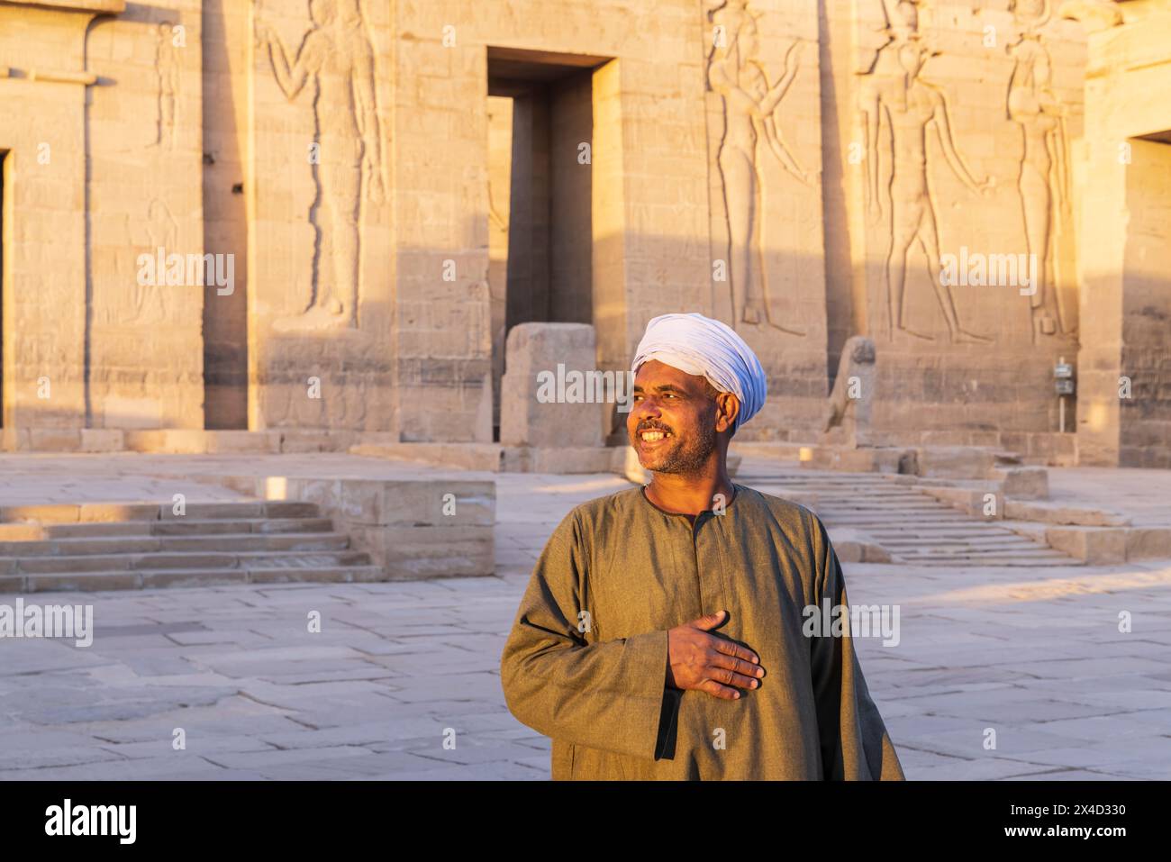 Agilkia Island, Assuan, Ägypten. Reiseleiter am Philae-Tempel, ein UNESCO-Weltkulturerbe. (Nur Für Redaktionelle Zwecke) Stockfoto