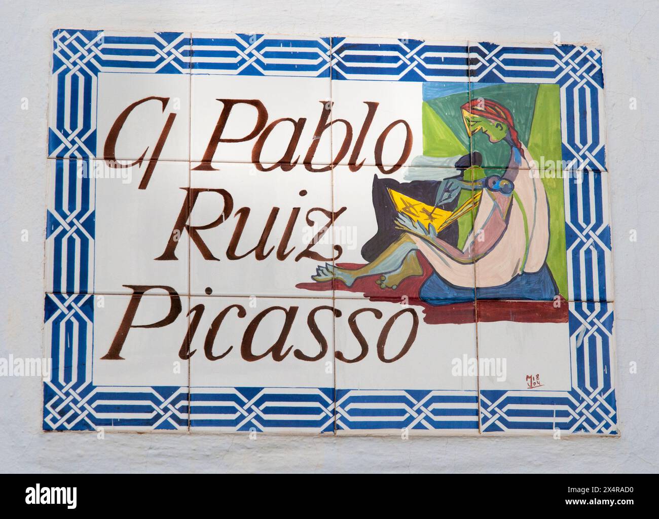 Azulejo- oder glasierte Fliesen-Kunstwerke, die eine nach Pablo Picasso benannte Wohnstraße im „Whie Village“ von Frigiliana, Andalusien, Spanien, identifizieren Stockfoto