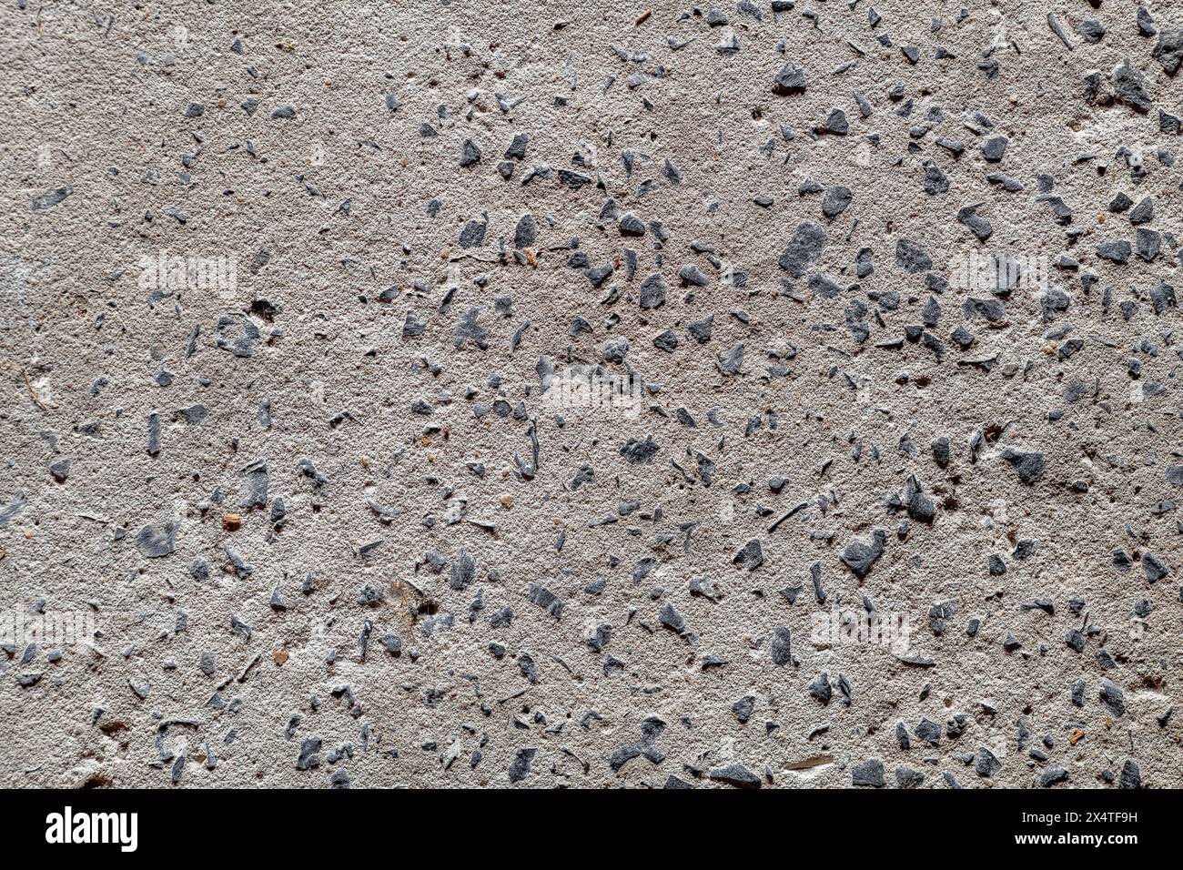 Betonhintergrundstruktur. Nahaufnahme des alten grauen Betonbodens oder der Wand. Stockfoto