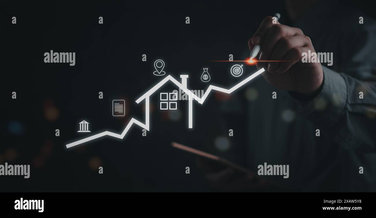 Zeichnen Sie mit der Hand einen Aufwärtstrend auf einem digitalen Diagramm, das Wachstum und Analysen symbolisiert. Stockfoto