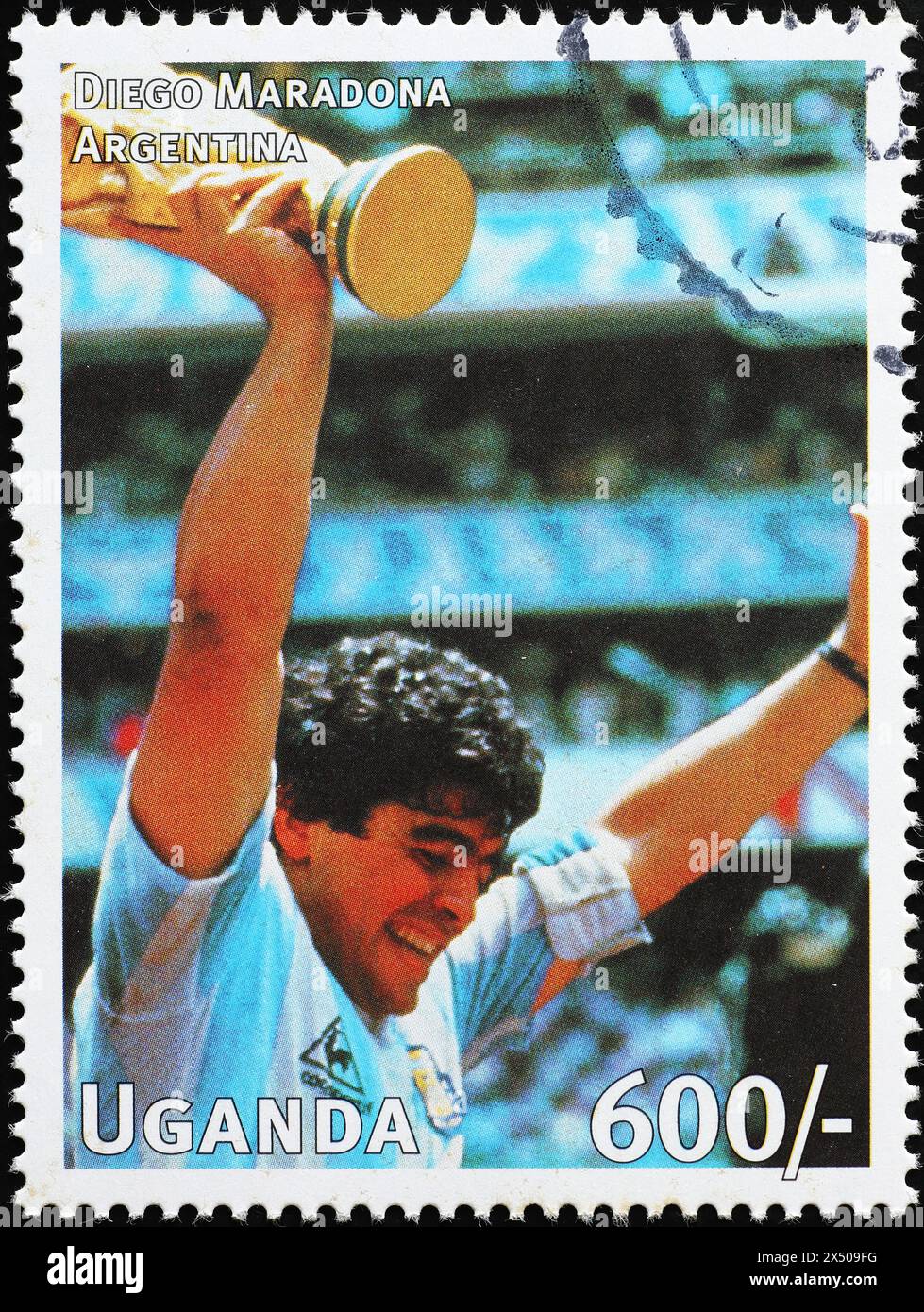 Diego Maradona mit der Weltmeisterschaft 1986 auf Briefmarke Stockfoto
