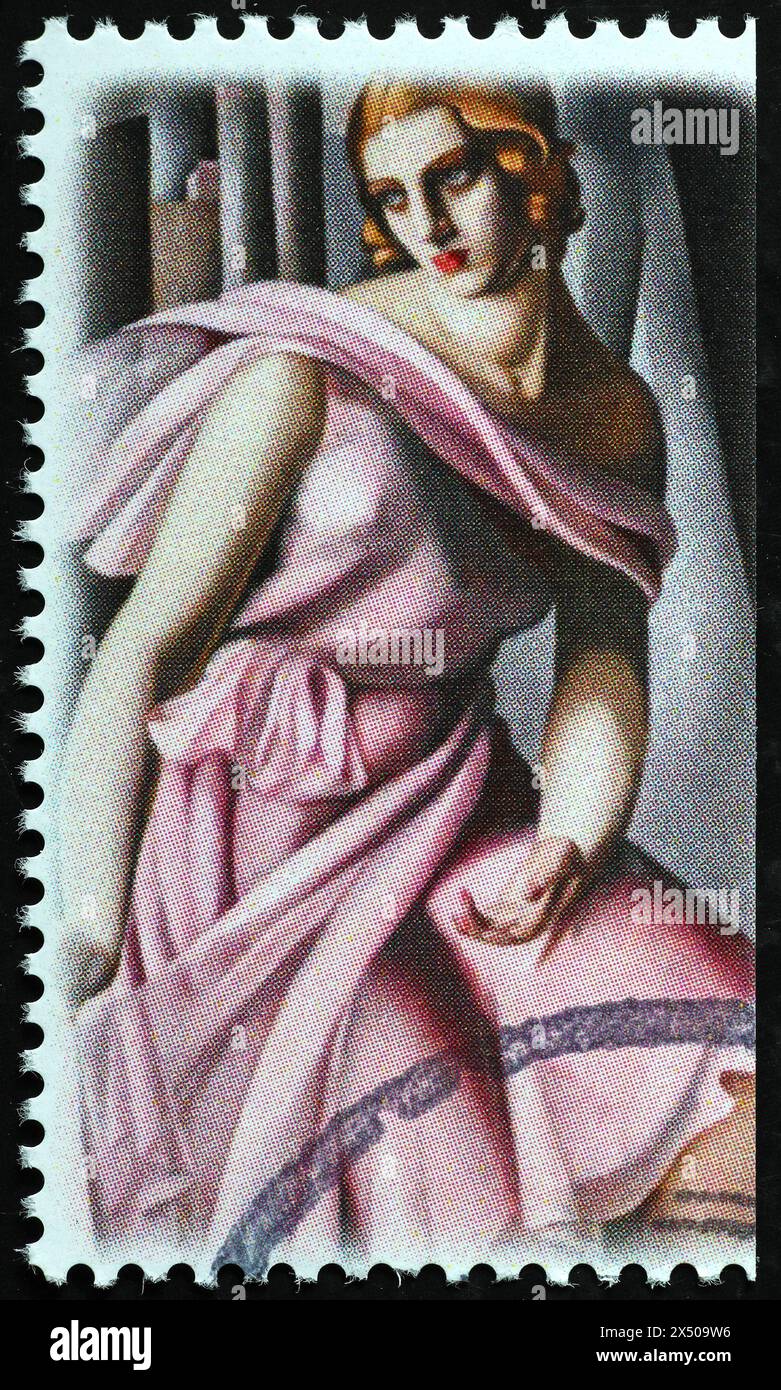 Frau in rosa gekleidet von Tamara de Lempicka auf Briefmarke Stockfoto