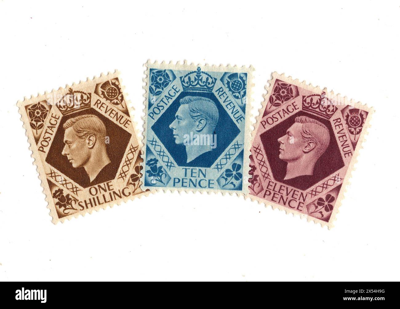Eine Montage von Briefmarken von König George VI. Aus Großbritannien auf weißem Hintergrund. Stockfoto