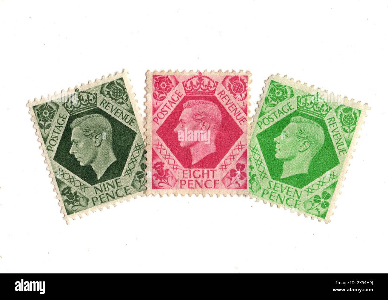 Eine Montage von Briefmarken von König George VI. Aus Großbritannien auf weißem Hintergrund. Stockfoto