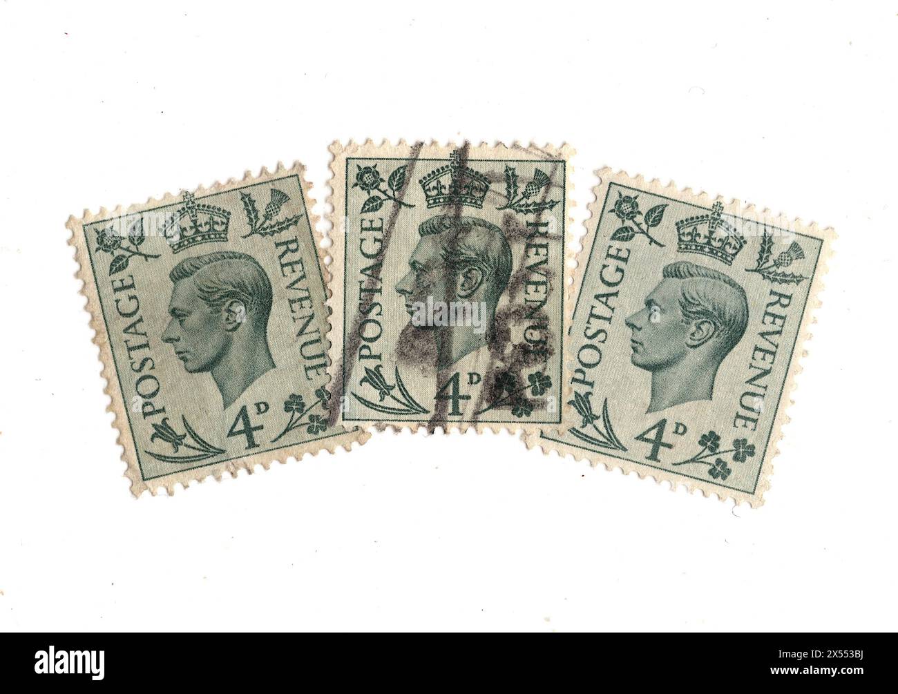 Eine Montage der Briefmarken von König Georg VI. 4. Aus Großbritannien auf weißem Hintergrund. Stockfoto