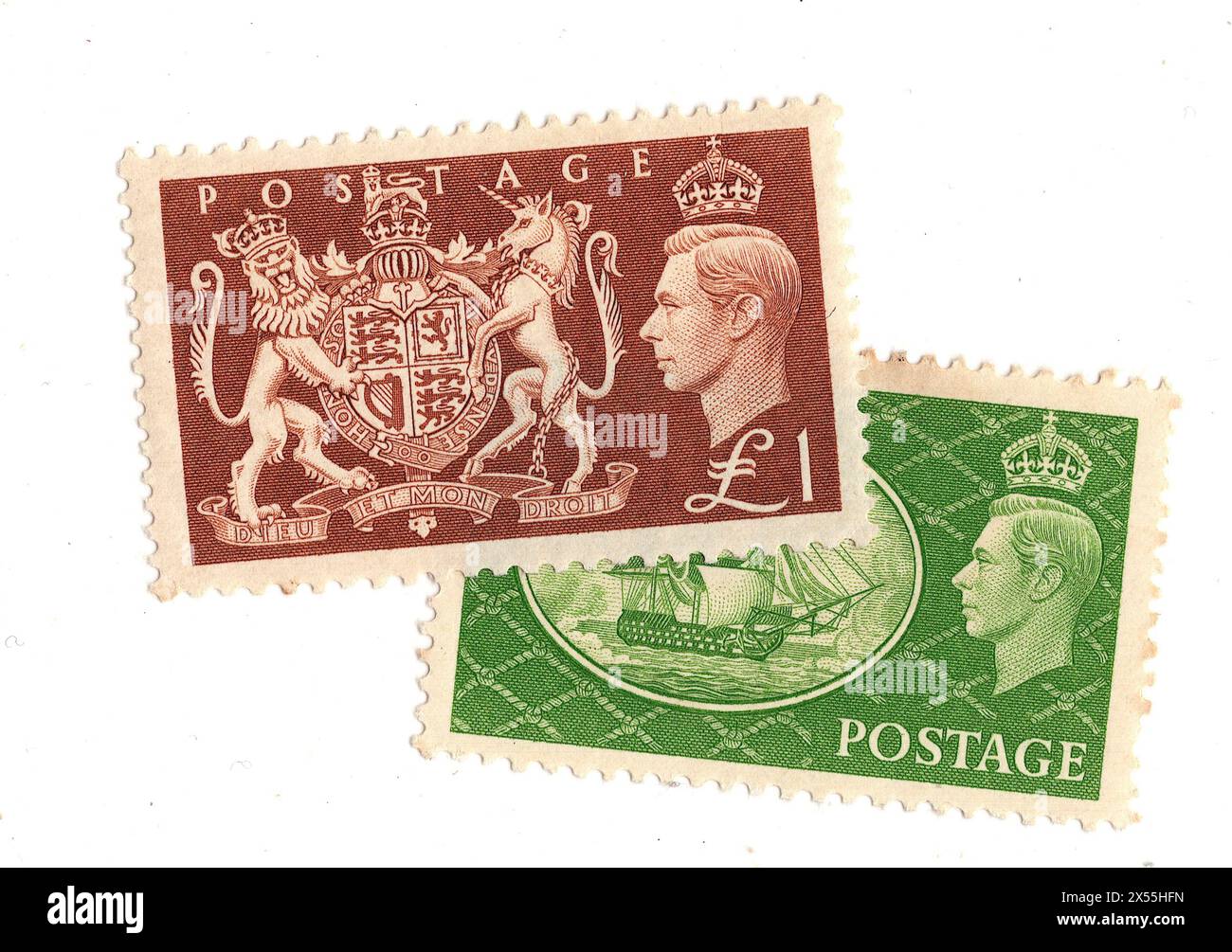 Ein Paar hochwertige Münzprägezeichen, King George VI. Briefmarken aus Großbritannien auf weißem Hintergrund. Stockfoto