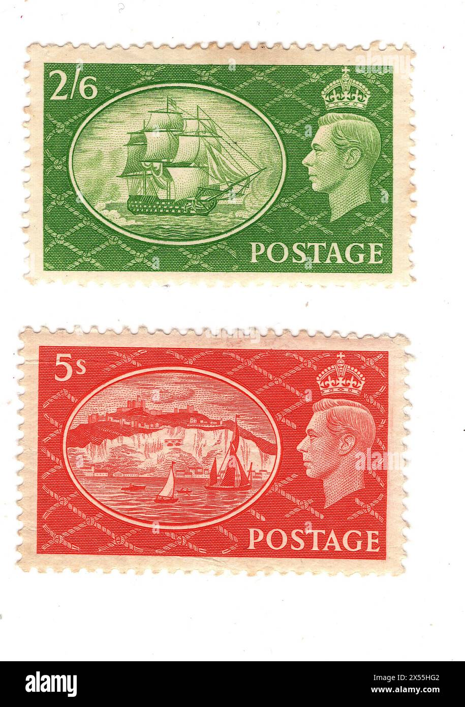 Ein Paar hochwertige Münzprägezeichen, King George VI. Briefmarken aus Großbritannien auf weißem Hintergrund. Stockfoto