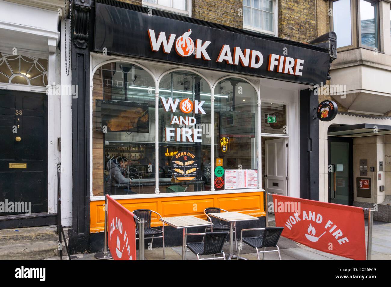Räumlichkeiten von Wok and Fire, einem panasiatischen Fusionsküche-Restaurant in Haymarket, London. Stockfoto