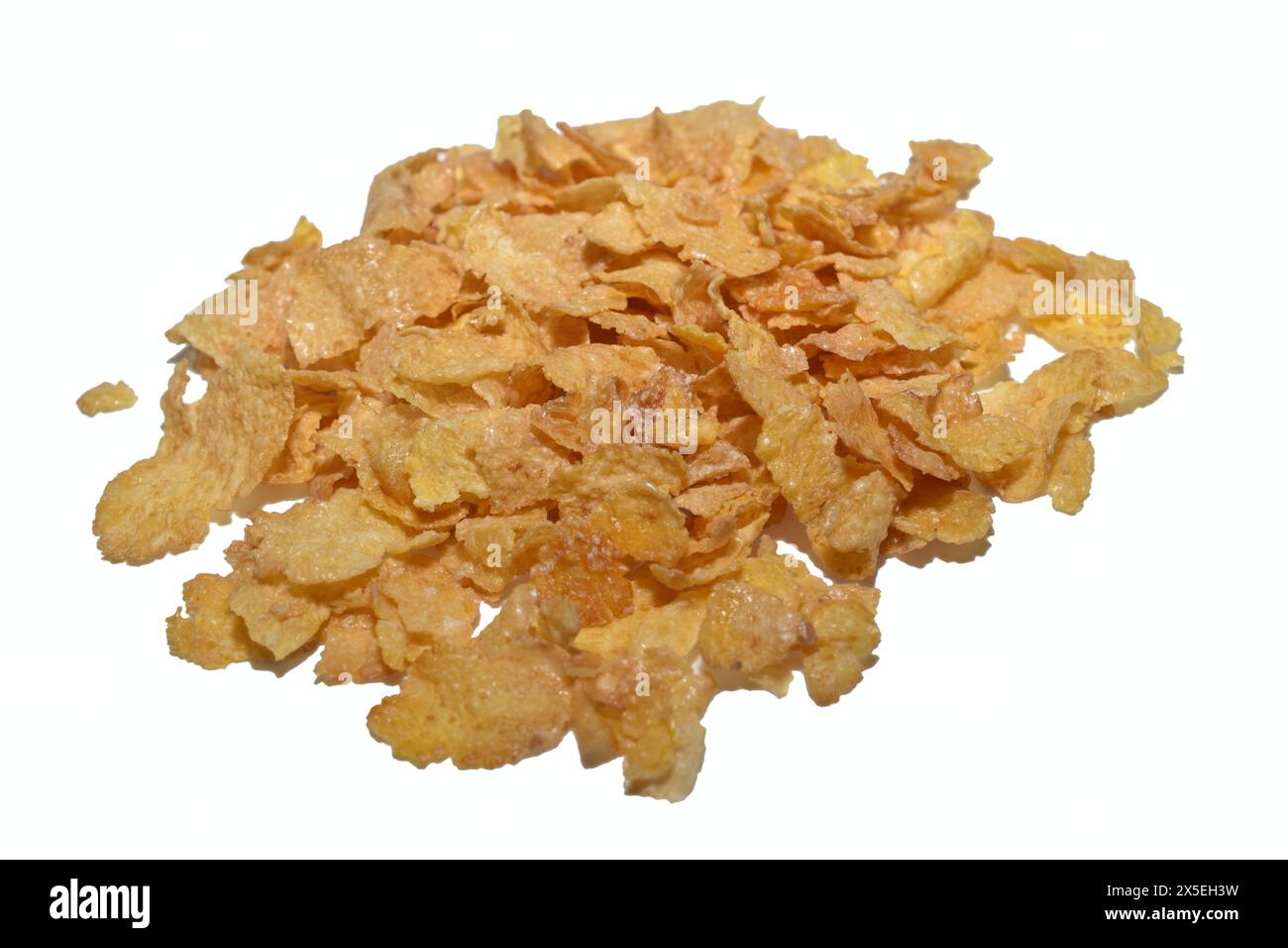 Cornflakes für ein köstliches Frühstück liegen auf weißem Hintergrund. Stockfoto