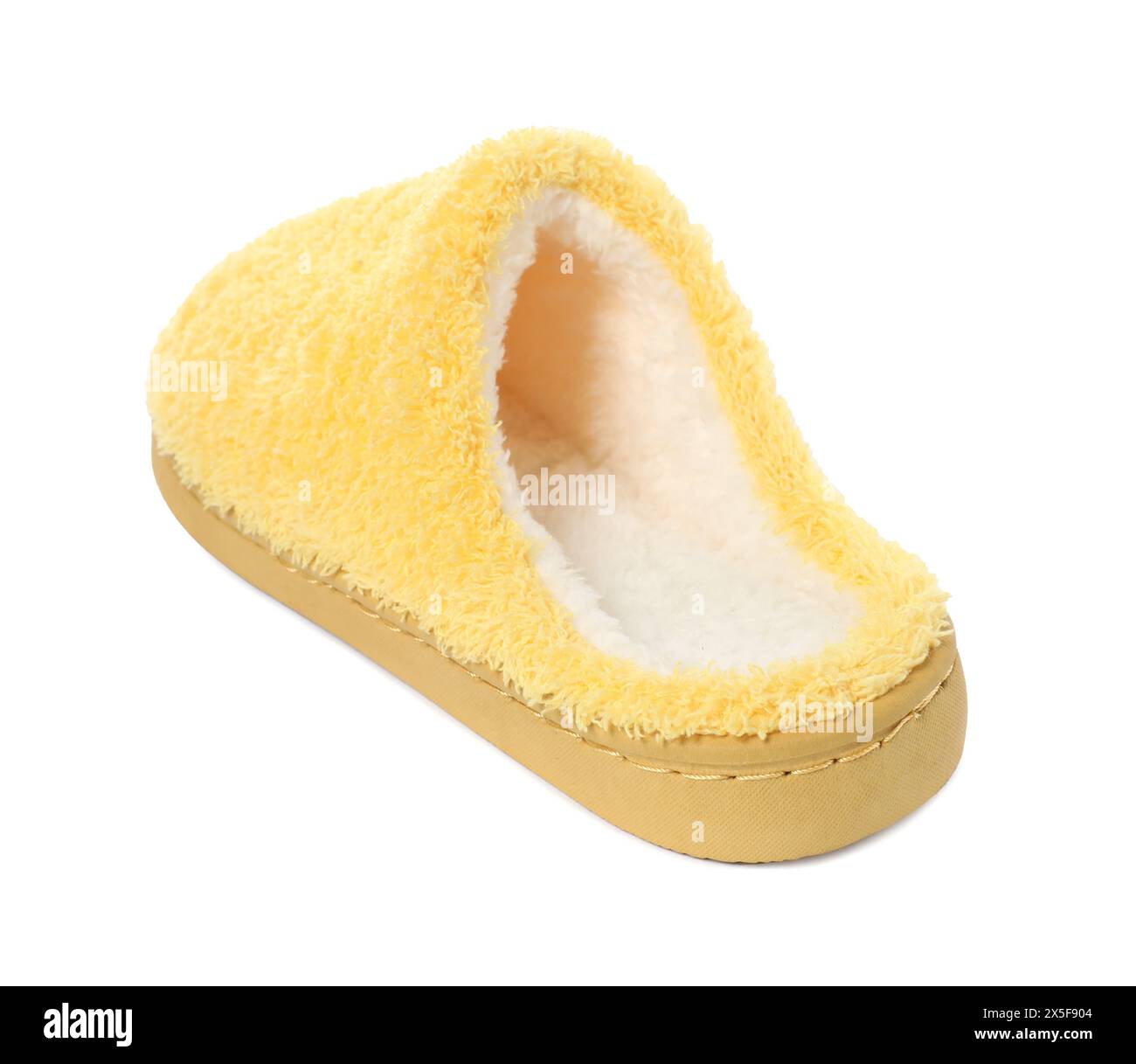 Ein gelber weicher Slipper isoliert auf weiß Stockfoto