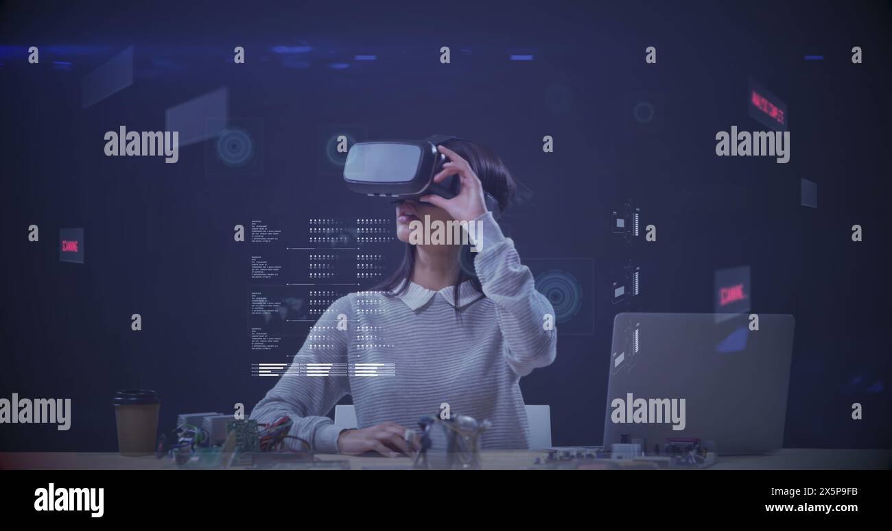 Kaukasierin, die ein Virtual-Reality-Headset trägt Stockfoto