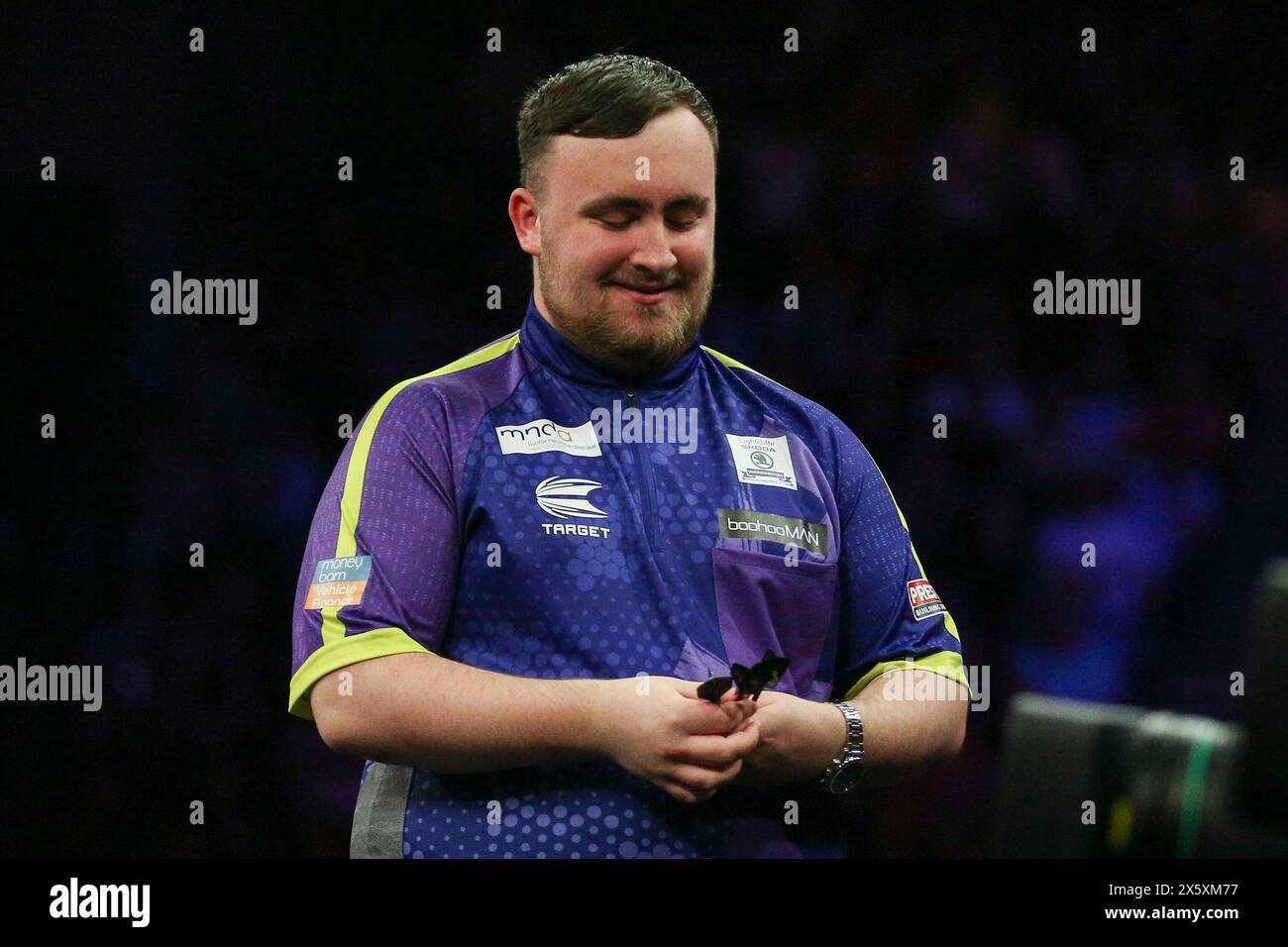 Leeds, Großbritannien. Mai 2024. Luke Little lächelt nach seiner Niederlage 2024 während der BetMGM Premier League Darts, Night 15, Leeds in der First Direct Arena, Leeds, England, Großbritannien am 9. Mai 2024 Credit: Every Second Media/Alamy Live News Stockfoto