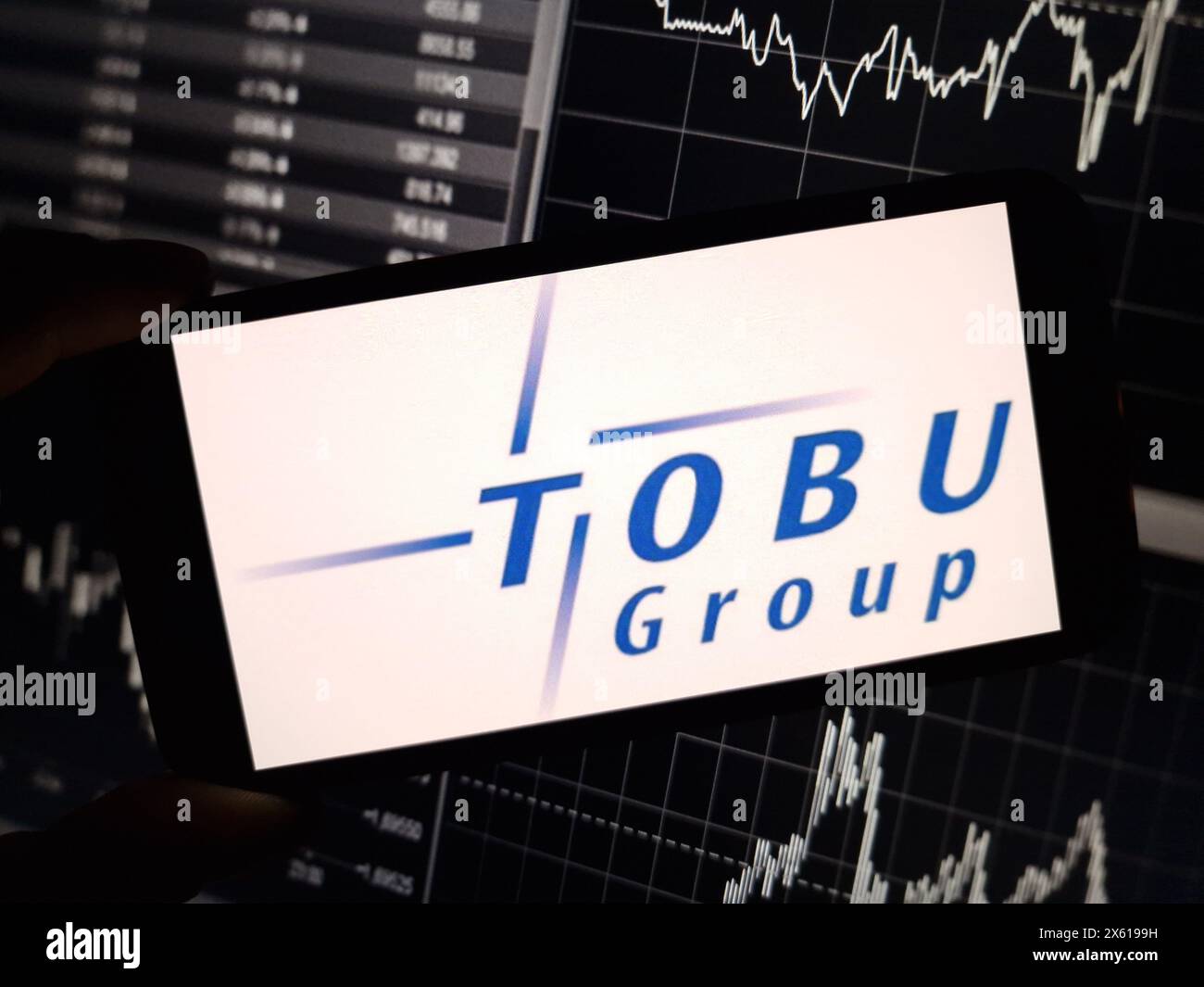 Konskie, Polen - 11. Mai 2024: Firmenlogo der Tobu Group auf dem Mobiltelefon Stockfoto