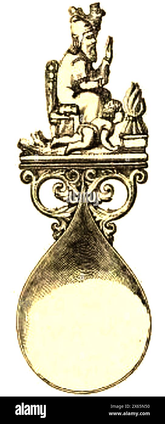 Ein alter elfenbeinfarbener Löffel mit einer Figur, die den Januar darstellt. Stockfoto