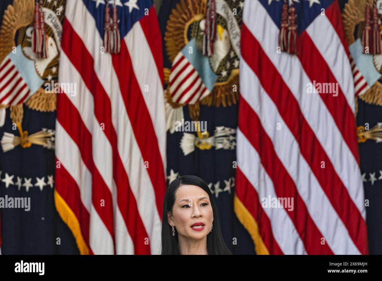 Washington, Usa. Mai 2024. Die asiatisch-amerikanische Schauspielerin Lucy Liu spricht während eines Empfangs im Rose Garden im Weißen Haus am 13. Mai 2024 in Washington, DC. Die Präsidentin und Vizepräsidentin veranstalten den Empfang, um den Monat des Erbes der asiatischen Amerikaner, der hawaiianischen Ureinwohner und der Pazifikinsel zu feiern. (Foto: Samuel Corum/SIPA USA) Credit: SIPA USA/Alamy Live News Stockfoto