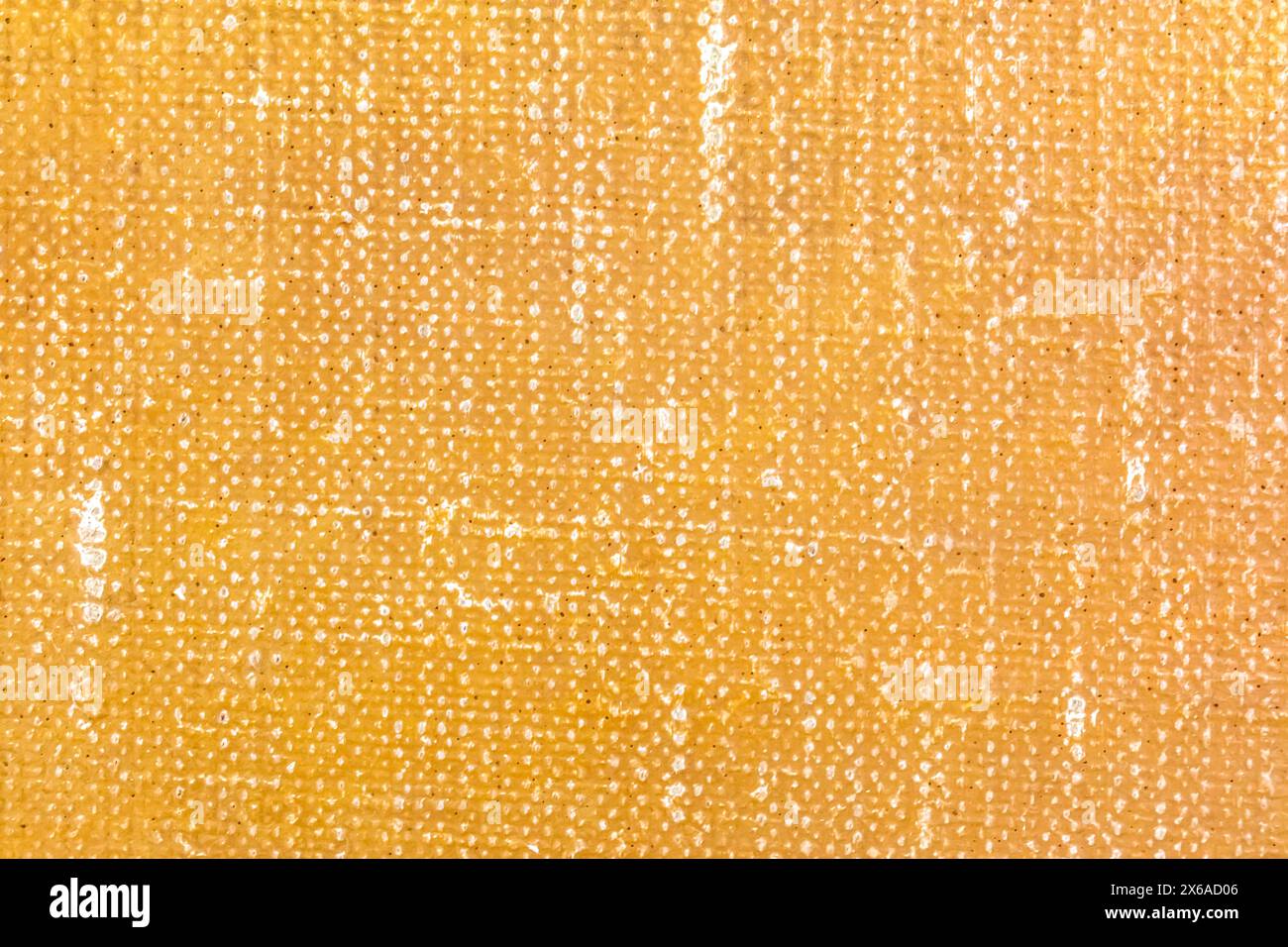 Handgemalte Leinwand in leuchtendem Orange. Stockfoto
