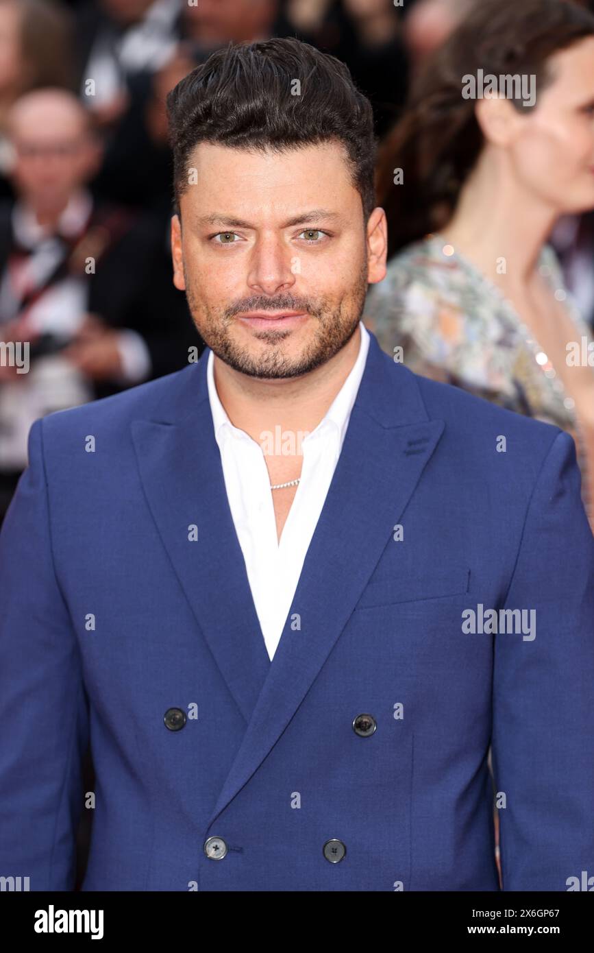 Cannes, Frankreich. Mai 2024. CANNES - 14. MAI: Kev Adams kommt zur ERÖFFNUNGSZEREMONIE und zur Premiere von „Le Deuxie?me Acte“ („der zweite Akt“) während der 77. Ausgabe des Filmfestivals von Cannes am 14. Mai 2024 im Palais des Festivals in Cannes, Frankreich. (Foto: Lyvans Boolaky/ÙPtertainment/SIPA USA) Credit: SIPA USA/Alamy Live News Stockfoto