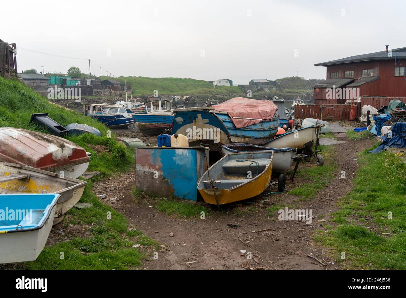 Südbahnhof, Nr. Redcar, North Yorkshire, Großbritannien. Bootswerft in einem kleinen Hafen, der lokal als Paddy's Hole bekannt ist. Stockfoto