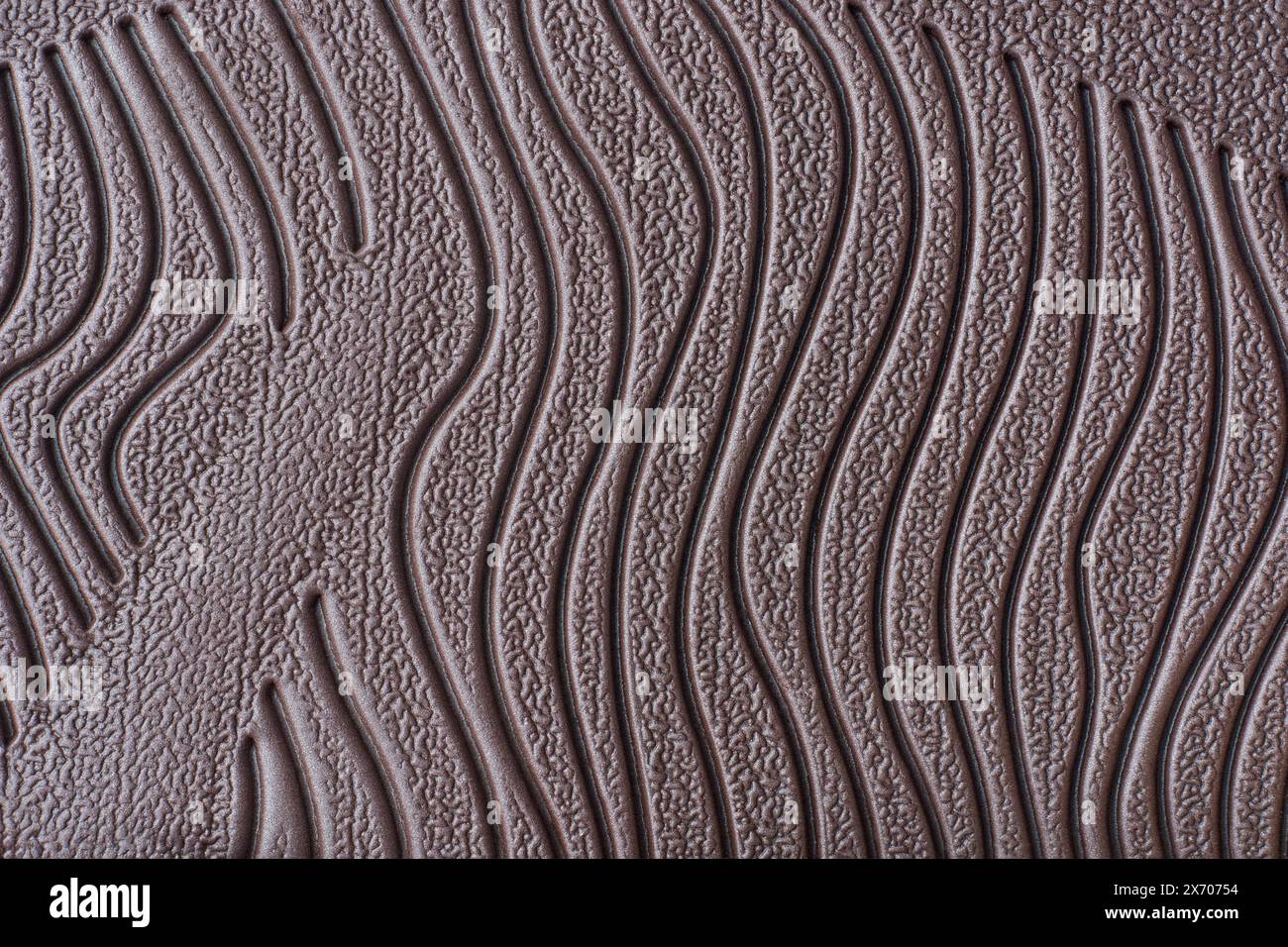 Nahaufnahme der Sohle mit Schuhmuster, abstrakt aus braunem Kautschuk und Rillen der Unterseite des Schuhs im Vollrahmen, Makrohintergrund oder Stockfoto