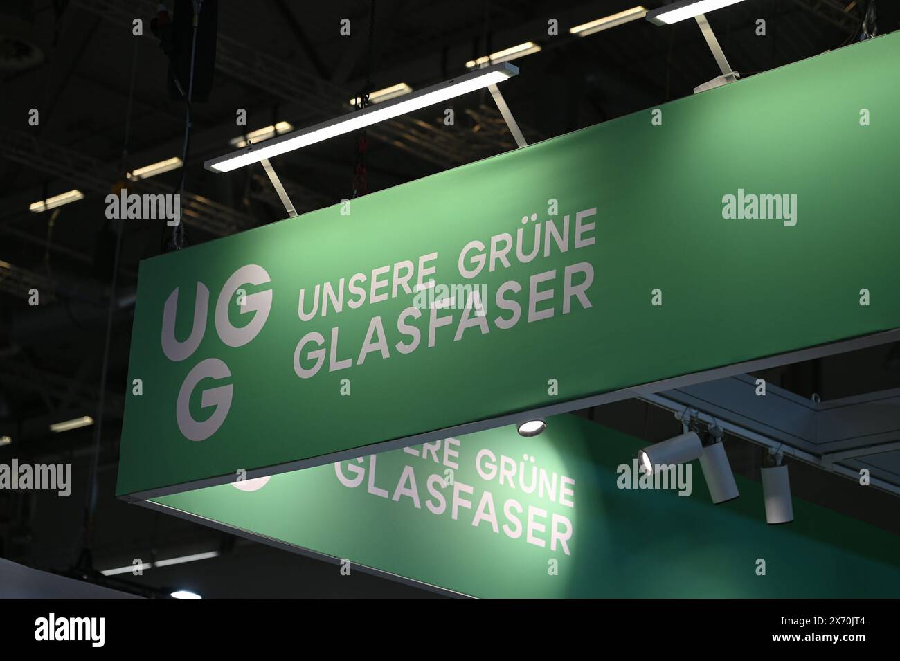 Köln, Deutschland. Mai 2024. Logo, Schriftzug unseres Green Fiber UGG, ein landesweites Glasfaserinfrastrukturunternehmen an einem Stand auf der Anagacom, Europas führender Kongressmesse für Breitband, Fernsehen und Online. Quelle: Horst Galuschka/dpa/Alamy Live News Stockfoto