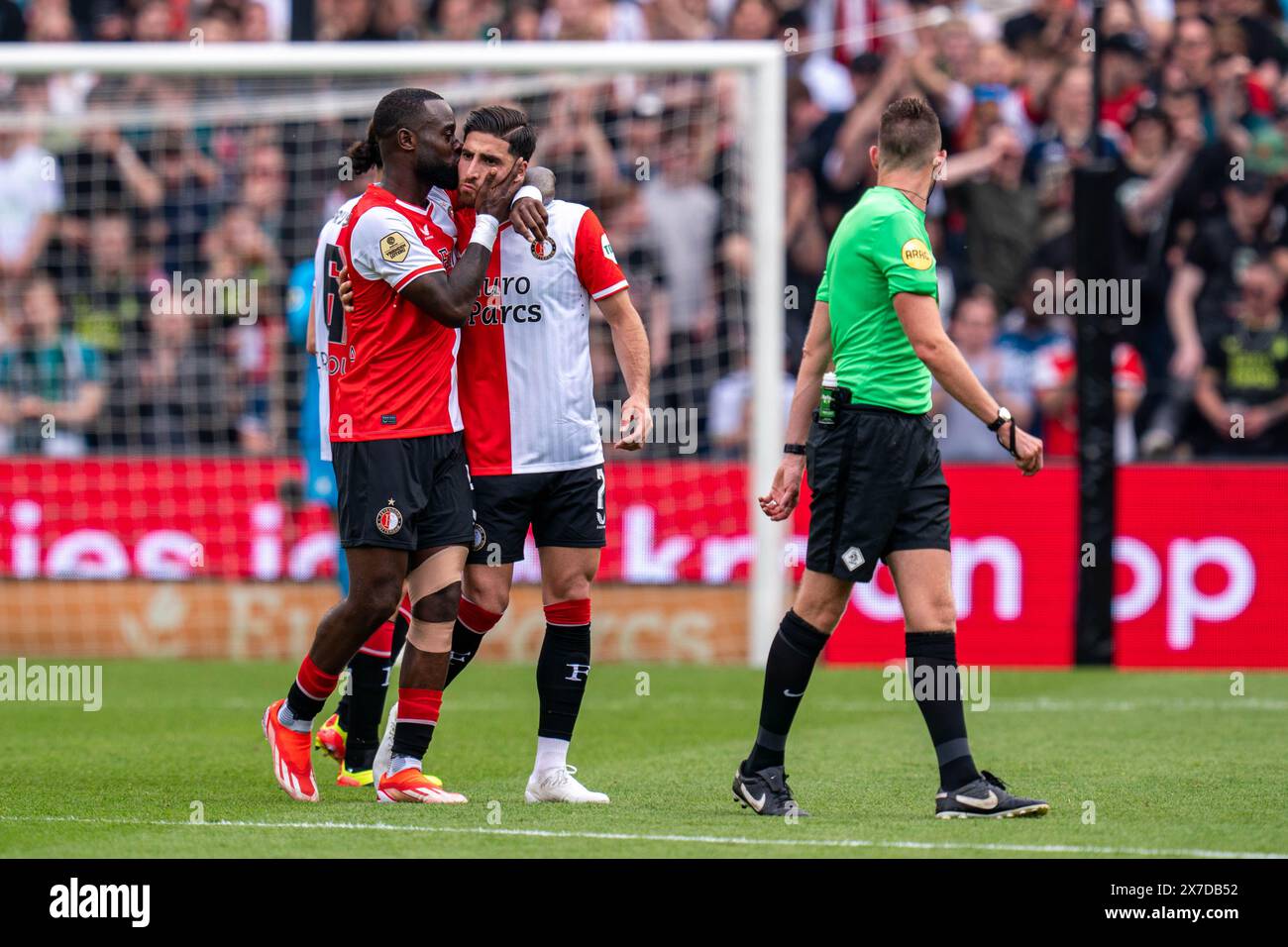 Rotterdam, Nederland. Mai 2024. ROTTERDAM, 19.05.2024, Stadion Feijenoord de kuip, Fußball, niederländische Eredivisie, Saison 2023/2024, Feyenoord - Excelsior, Ergebnis 4:0, Feyenoord-Verteidiger Lutshare Geertruida (l) gibt einen Kuss an Feyenoord-Spieler Alireza Jahanbakhsh, der auch sein letztes Spiel für Feyenoord spielt. Credit: Pro Shots/Alamy Live News Stockfoto