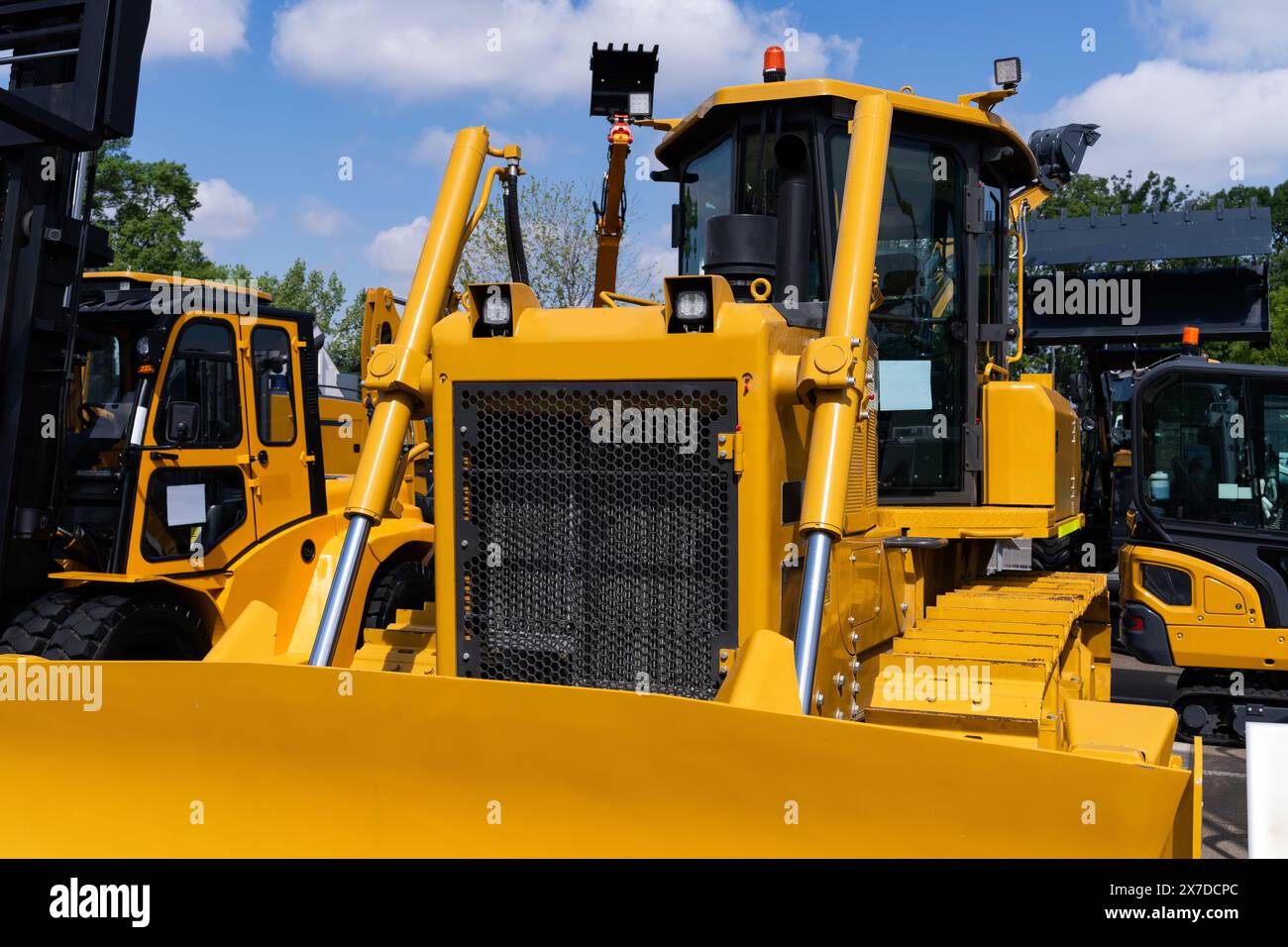 Flotte von gelben Baumaschinen.. Stockfoto