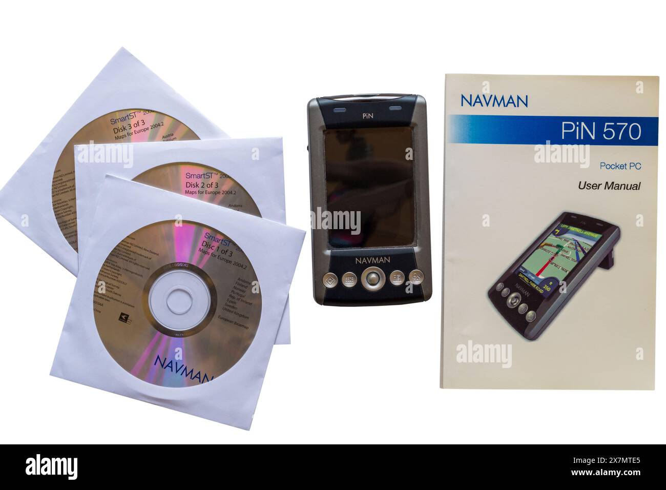 Navman Pin 570 Pocket PC persönliche interaktive Navigation mit Benutzerhandbuch und Discs isoliert auf weißem Hintergrund - Navigation mit persönlicher Interaktion Stockfoto