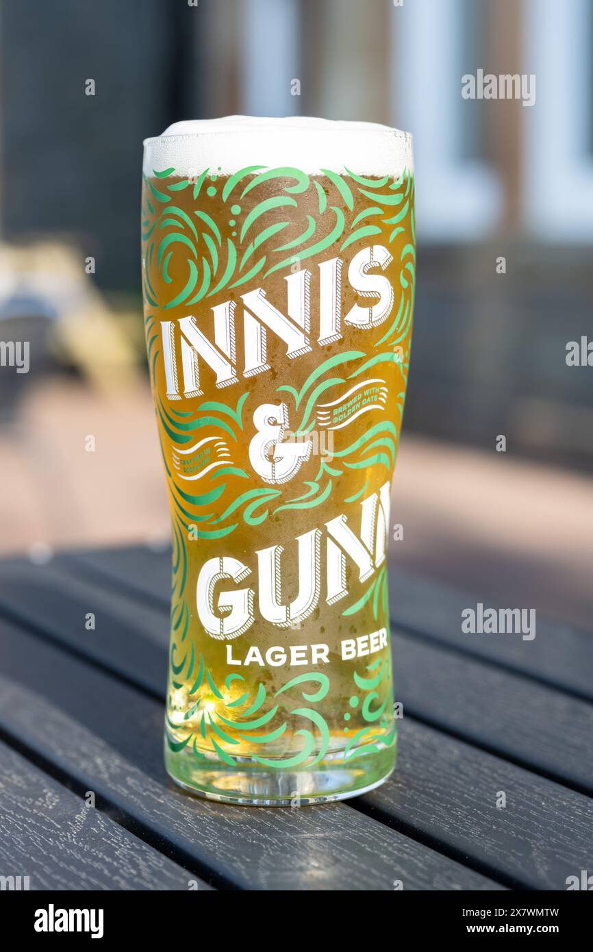 Innis und Gunn Lager Bier Pint Glas - UK Stockfoto