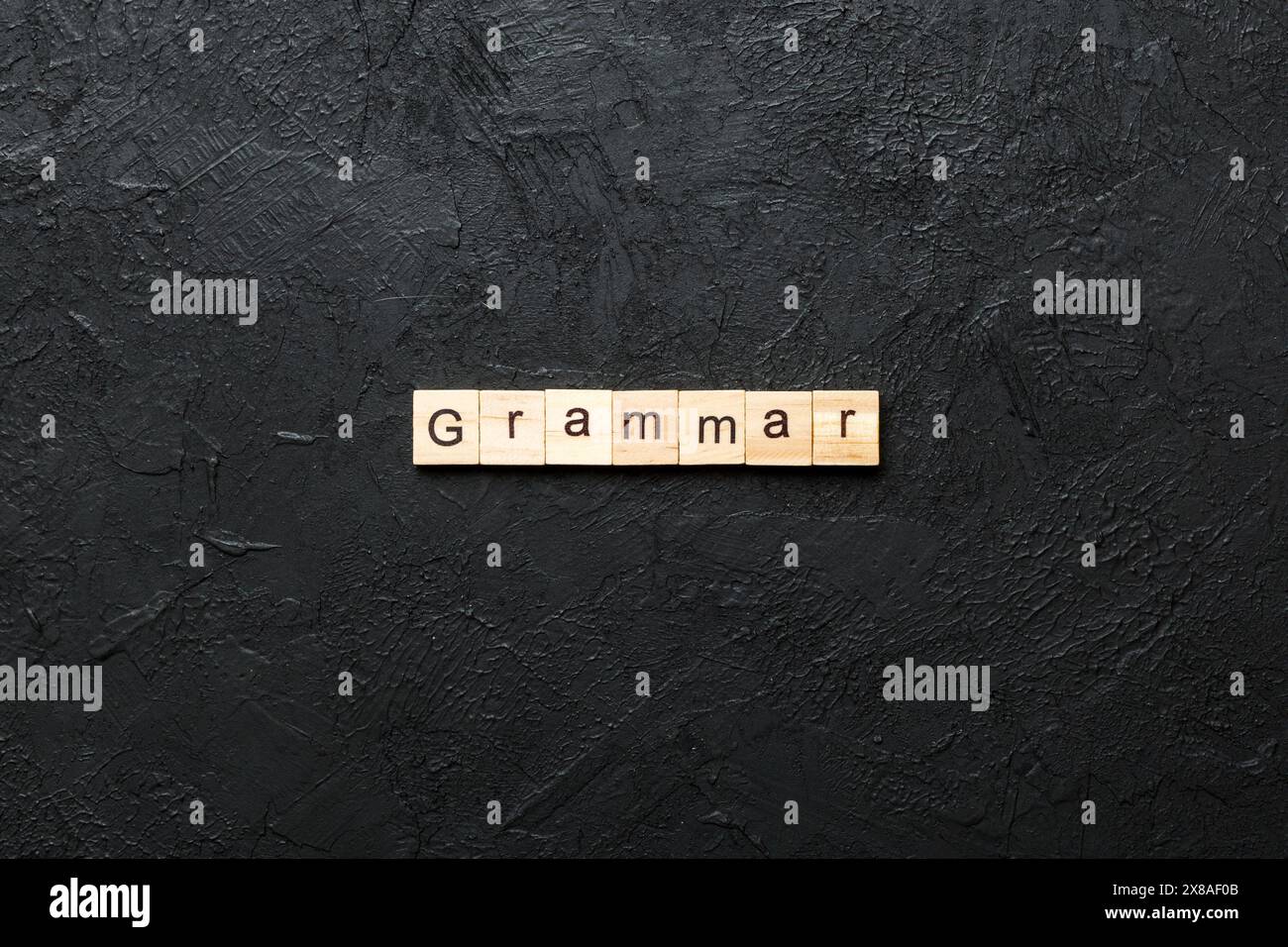 Grammatik Wort auf Holz Block geschrieben. Grammatik text auf Tisch, Konzept. Stockfoto