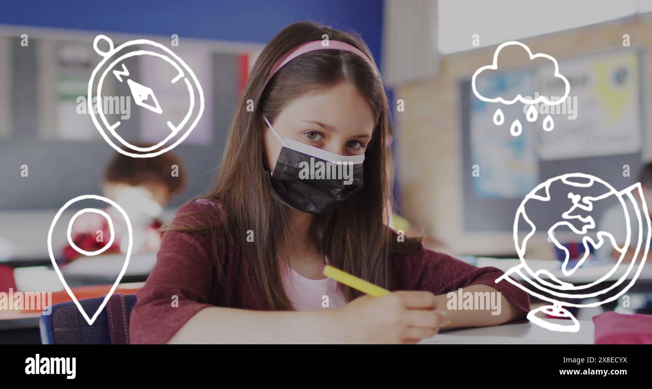 In der Schule sitzt eine kaukasische Schülerin mit Maske an einem Schreibtisch Stockfoto