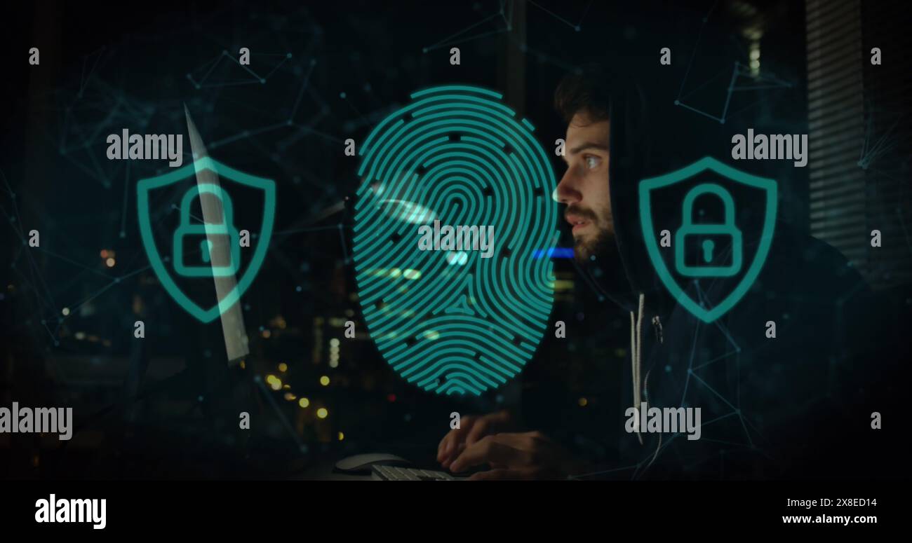 Kaukasischer, männlicher Profi, mit dunklem Hemd, fokussiert auf einen Computerbildschirm Stockfoto