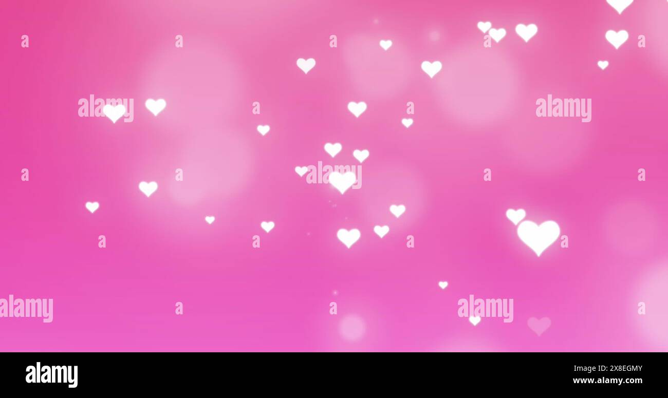 Bild von beleuchteten weißen Herzformen, die auf rosa Hintergrund fallen Stockfoto