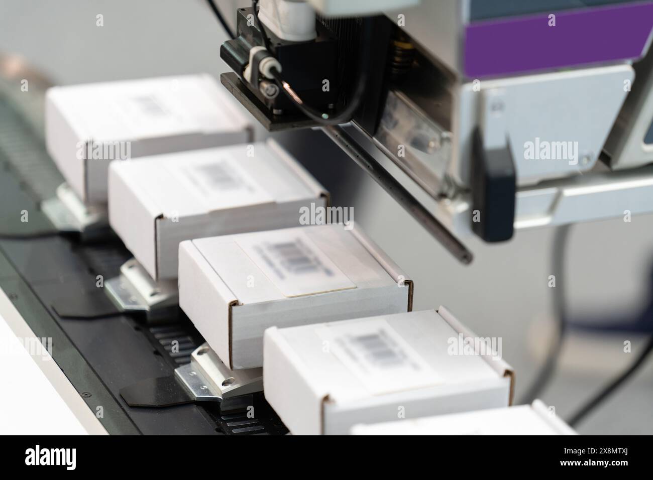 Gerät zum Beschriften von Barcodes auf Kartons Stockfoto