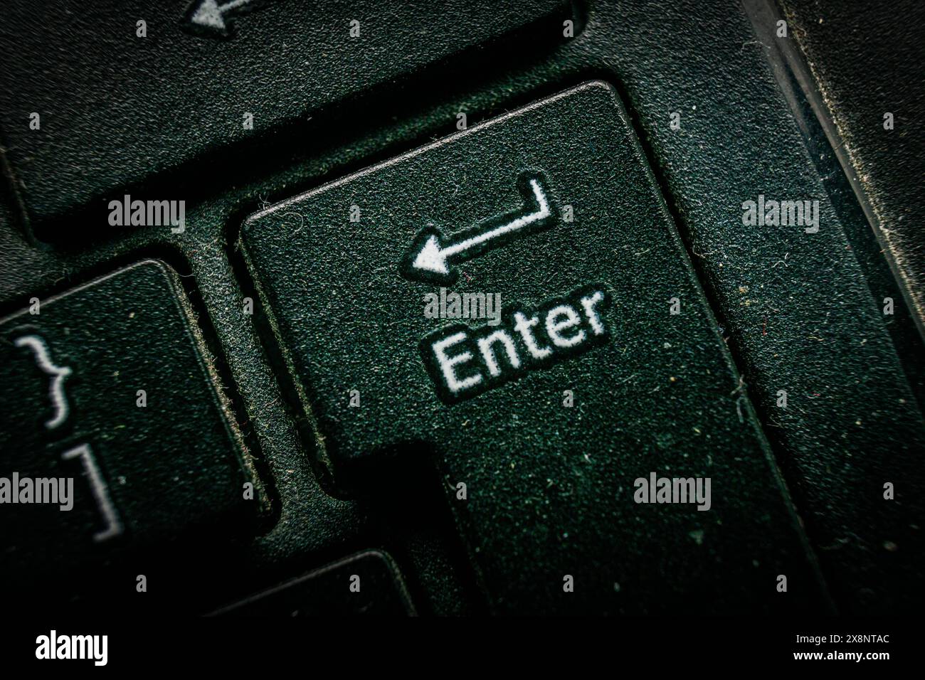 Nahaufnahme der Computertastatur mit Eingabetaste Stockfoto