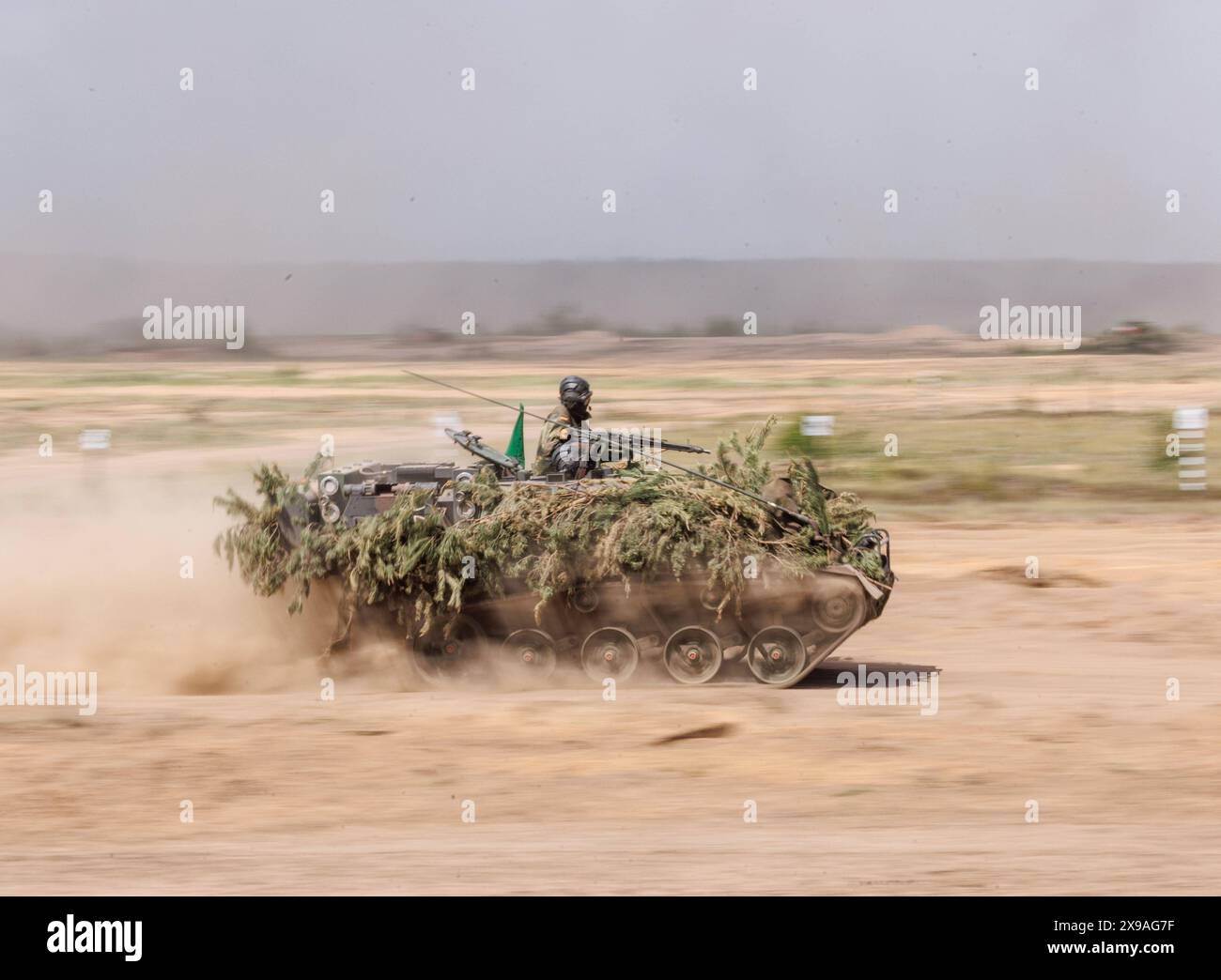 Ein deutscher Soldat auf einem Transportpanzer M113, aufgenommen waehrend des NATO-Grossmanoevers standhafter Verteidiger in Pabrade, 29.05.2024. Pabrade Litauen *** Ein deutscher Soldat auf einem gepanzerten Transportfahrzeug M113, fotografiert während des NATO Standfast Defender Großmanövers in Pabrade, 29 05 2024 Pabrade Litauen Copyright: xJulianexSonntagxphotothek.dex Stockfoto