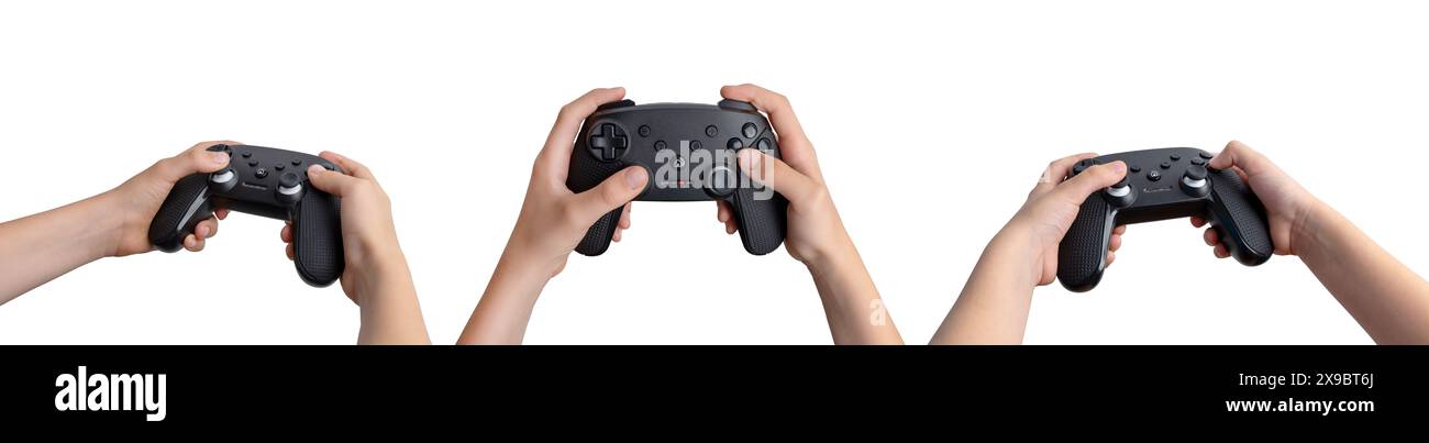 Dreiwinkelansicht eines Kindes, das ein Gamepad in der linken, vorderen und rechten Position hält, isoliert in weiß. Perfekt für Spiele, Technologie und Kinder Stockfoto