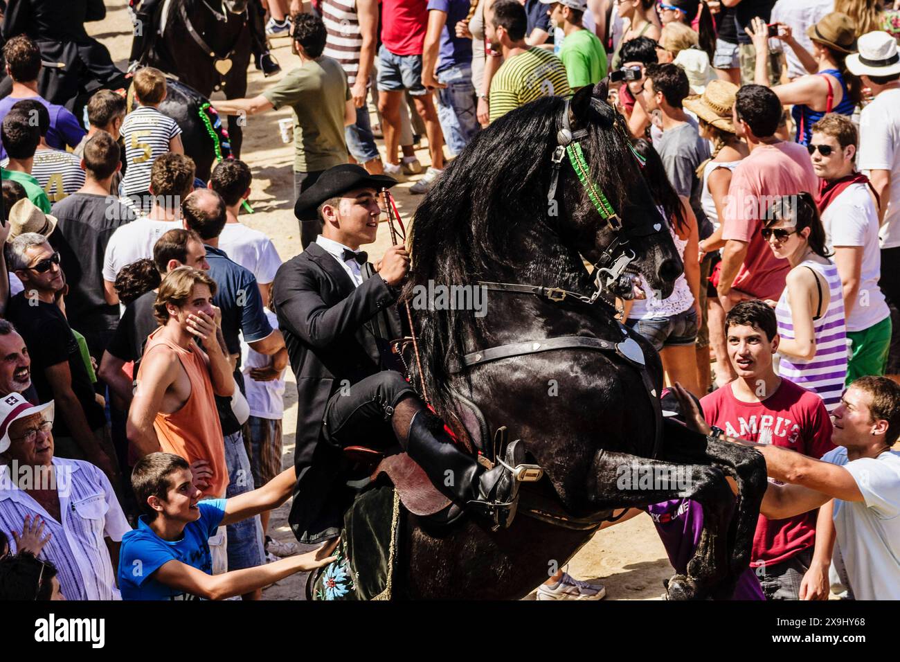 PLA-Spiele, galoppierende Reiter, Sant Joan Festival. Ciutadella. Menorca, Balearen, Spanien. Stockfoto