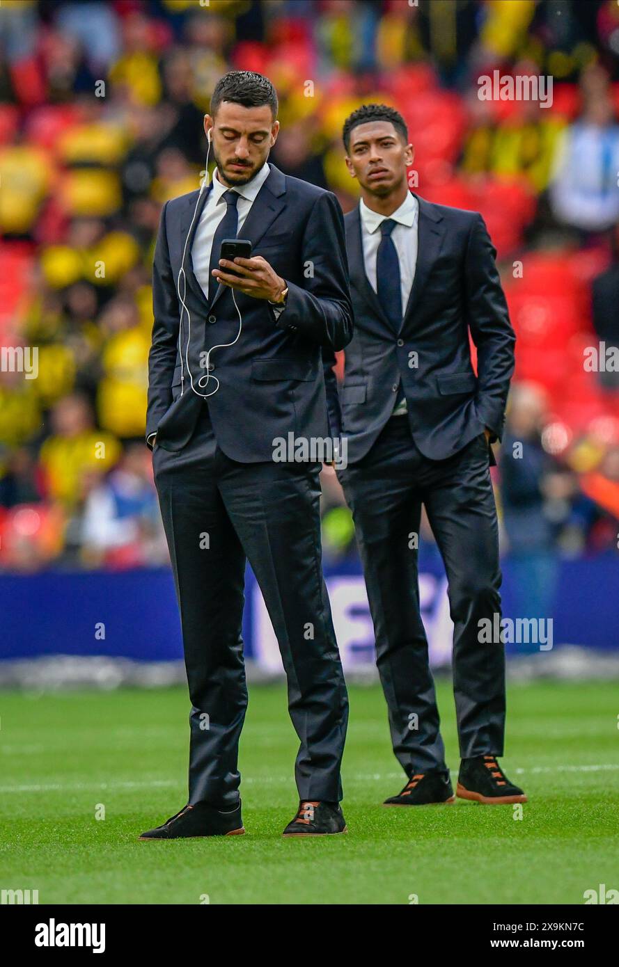 London, Großbritannien. Juni 2024. Joselu und Jude Bellingham von Real Madrid treffen im Stadion vor dem Finale der UEFA Champions League 2024 zwischen Borussia Dortmund und Real Madrid in Wembley in London ein. (Foto: Gonzales Photo/Alamy Live News Stockfoto