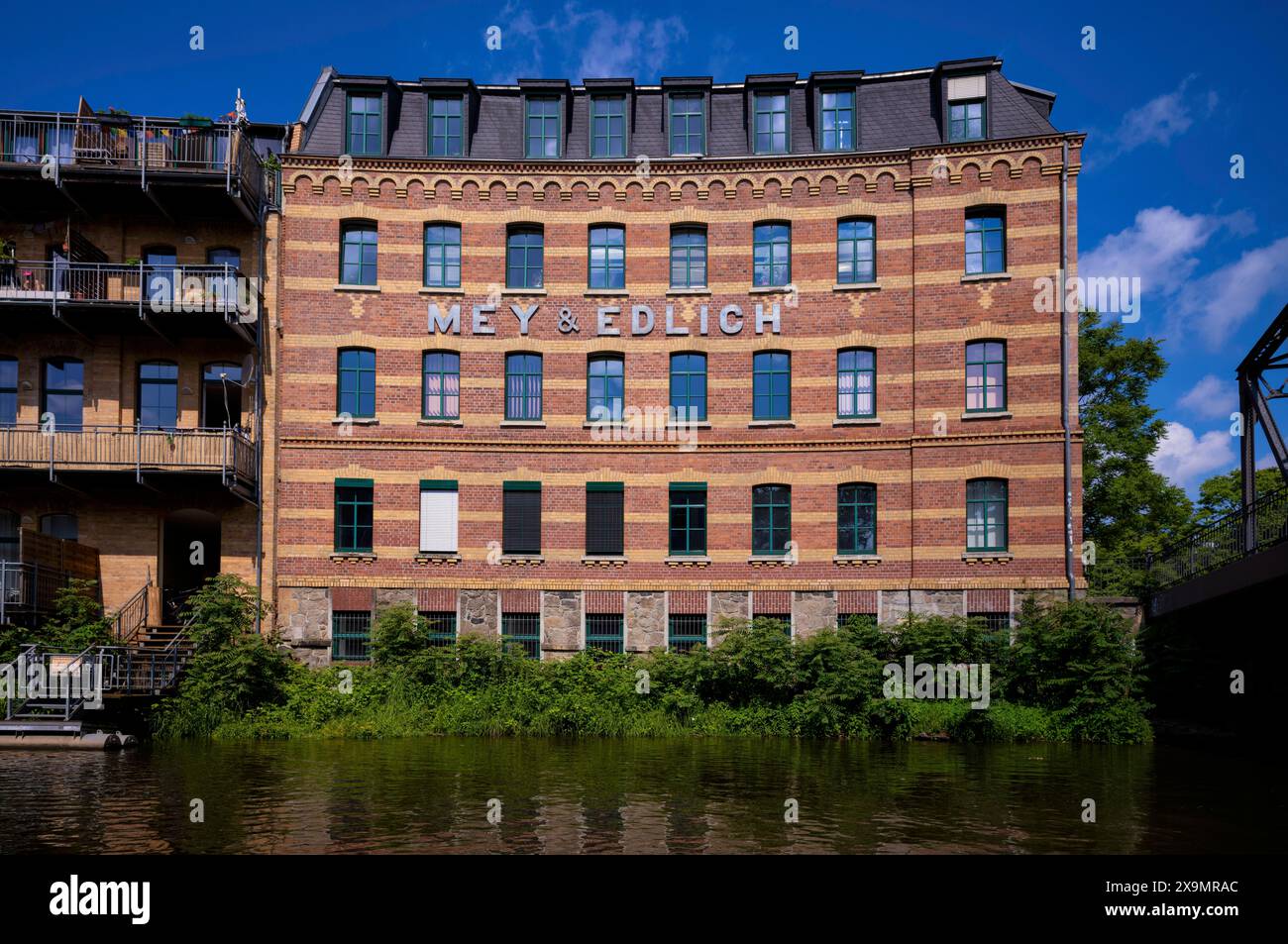 Früher das älteste Versandunternehmen Deutschlands, Mey und Edlich, Schriftzug, ehemaliger Industriekomplex in Wohnraum, Wohnungen, Kultur umgewandelt Stockfoto