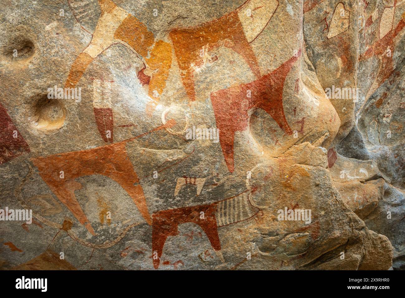 Uralte Felsenkunst der Stämme primitive Schnitzereien von Rindern und Jägern, Laas Geel, Maroodi Jeex, Hargeisa, Somaliland Stockfoto