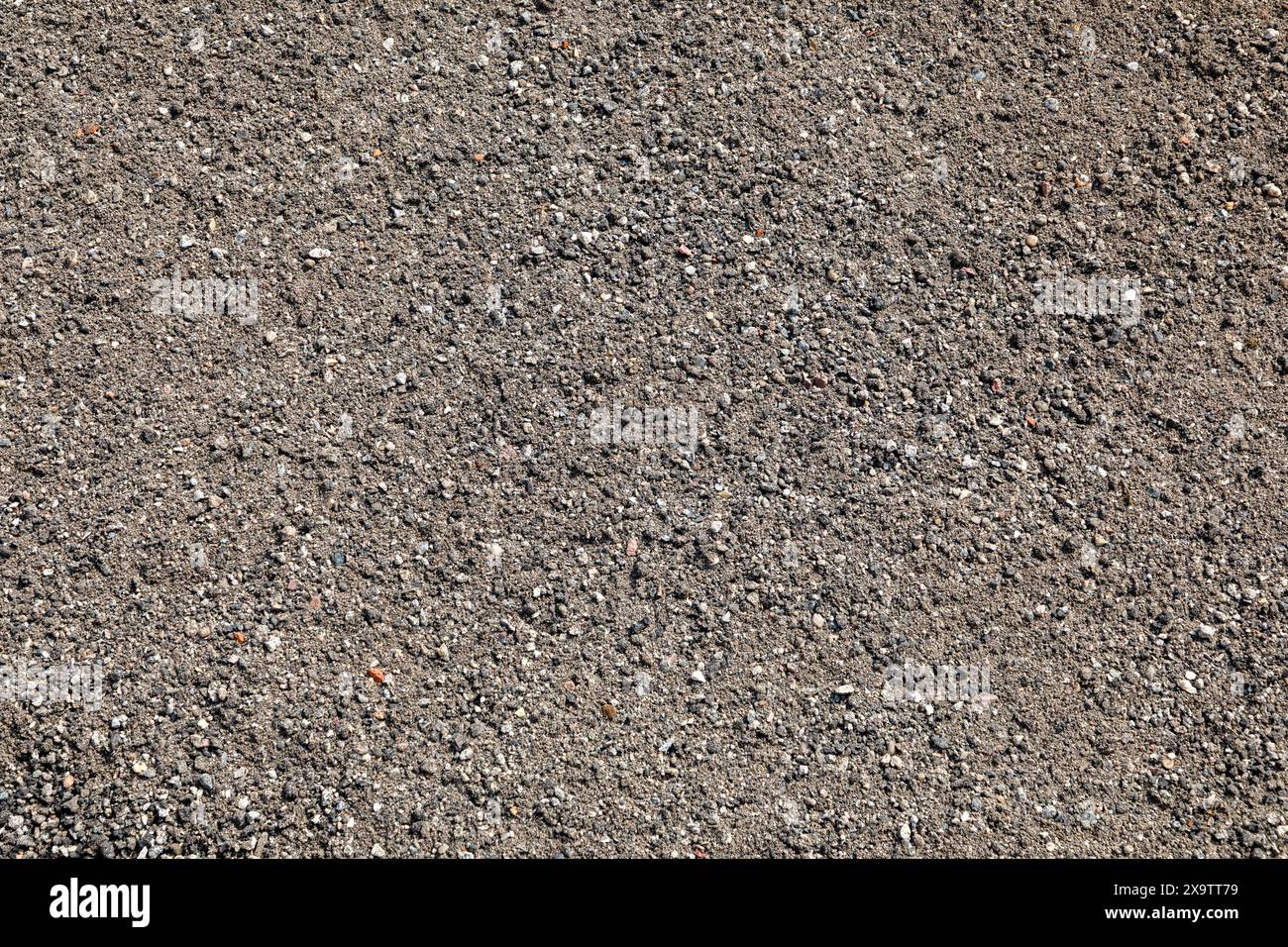 Muster von schwarzem Kies als harmonischer Hintergrund Stockfoto