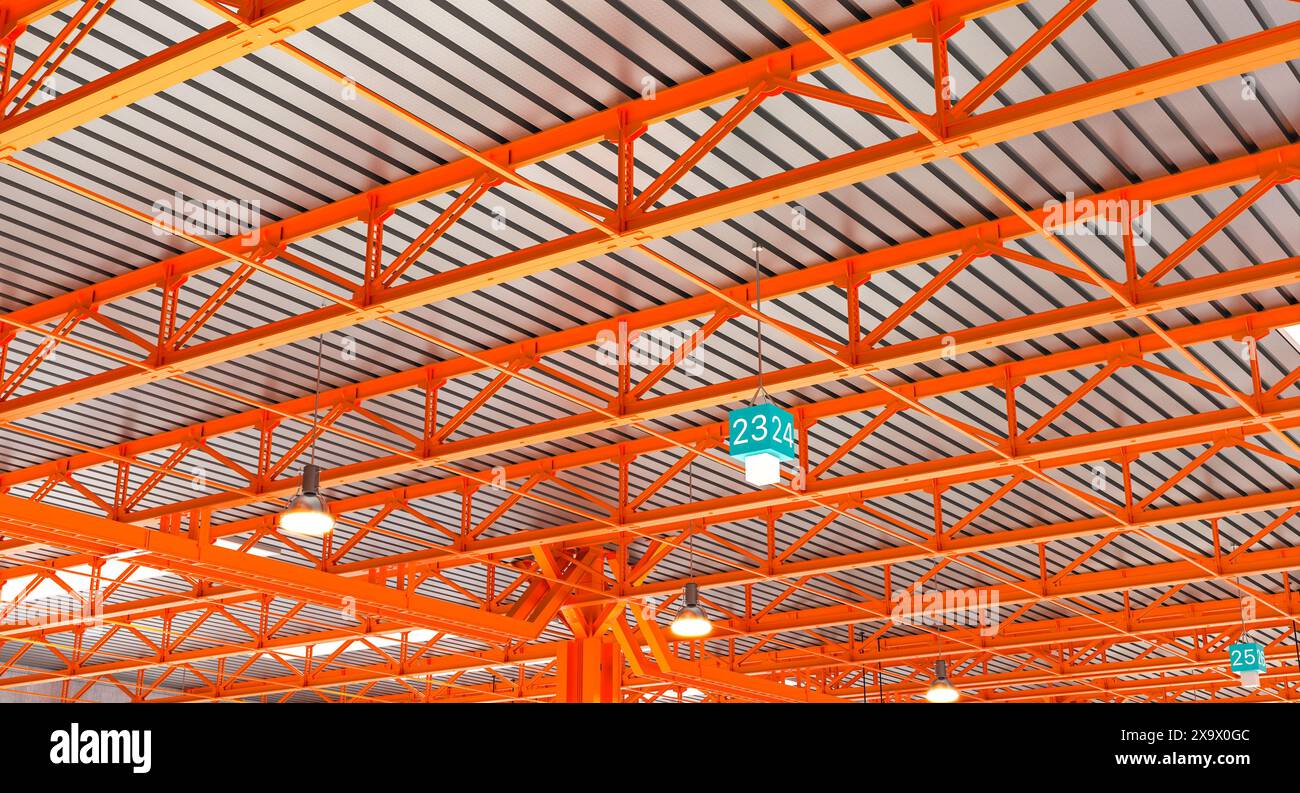 Industriestahlkonstruktion modernes orangefarbenes Metalldach Stockfoto