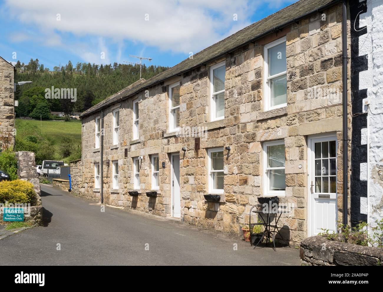 Steinhäuser in Providence Lane, Rothbury, Northumberland, England, Großbritannien Stockfoto