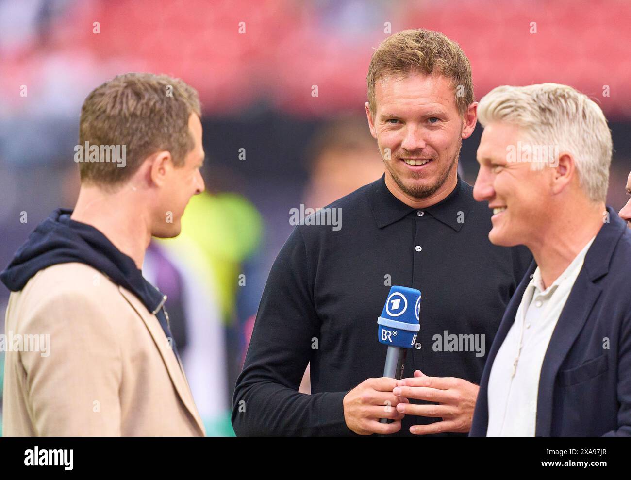 DFB-Trainer Julian Nagelsmann, Bundestrainer, Nationaltrainer, Bastian SCHWEINSTEIGER, Co-Moderator ARD Alexander Bommes TV-Moderator im Freundschaftsspiel DEUTSCHLAND - UKRAINE 0-0 DEUTSCHLAND - UKRAINE in Vorbereitung auf die Europameisterschaft 2024 am 3. Juni 2024 in Nürnberg. Fotograf: ddp Images/STAR-Images Credit: ddp Media GmbH/Alamy Live News Stockfoto