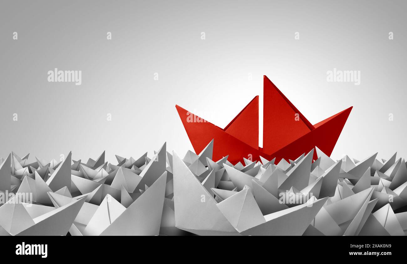 Erfolg der Business Leadership und Führung durch eine motivierende Führungskraft als Metapher für Erfolg und kreatives Management mit Origami-Papierbooten. Stockfoto